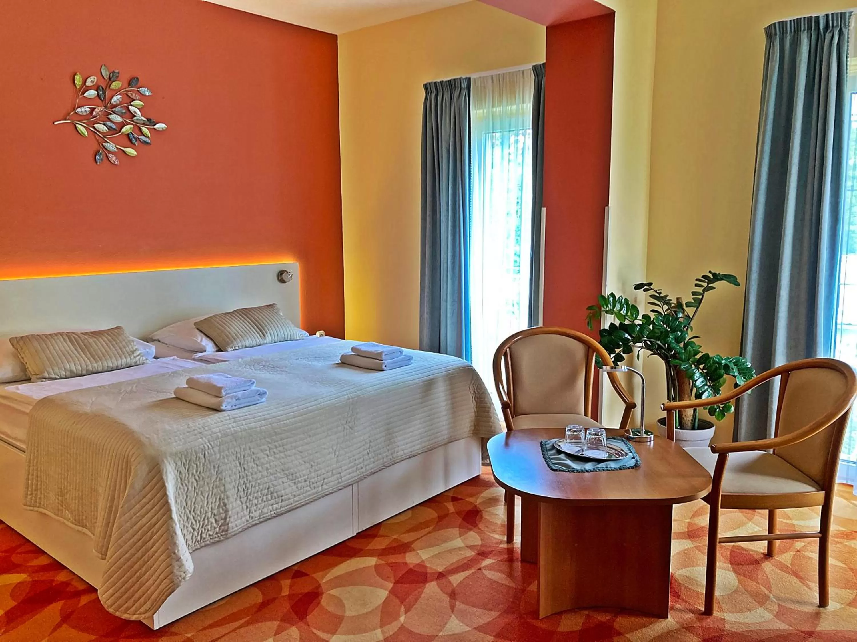 Bed in Hotel Penta Lux