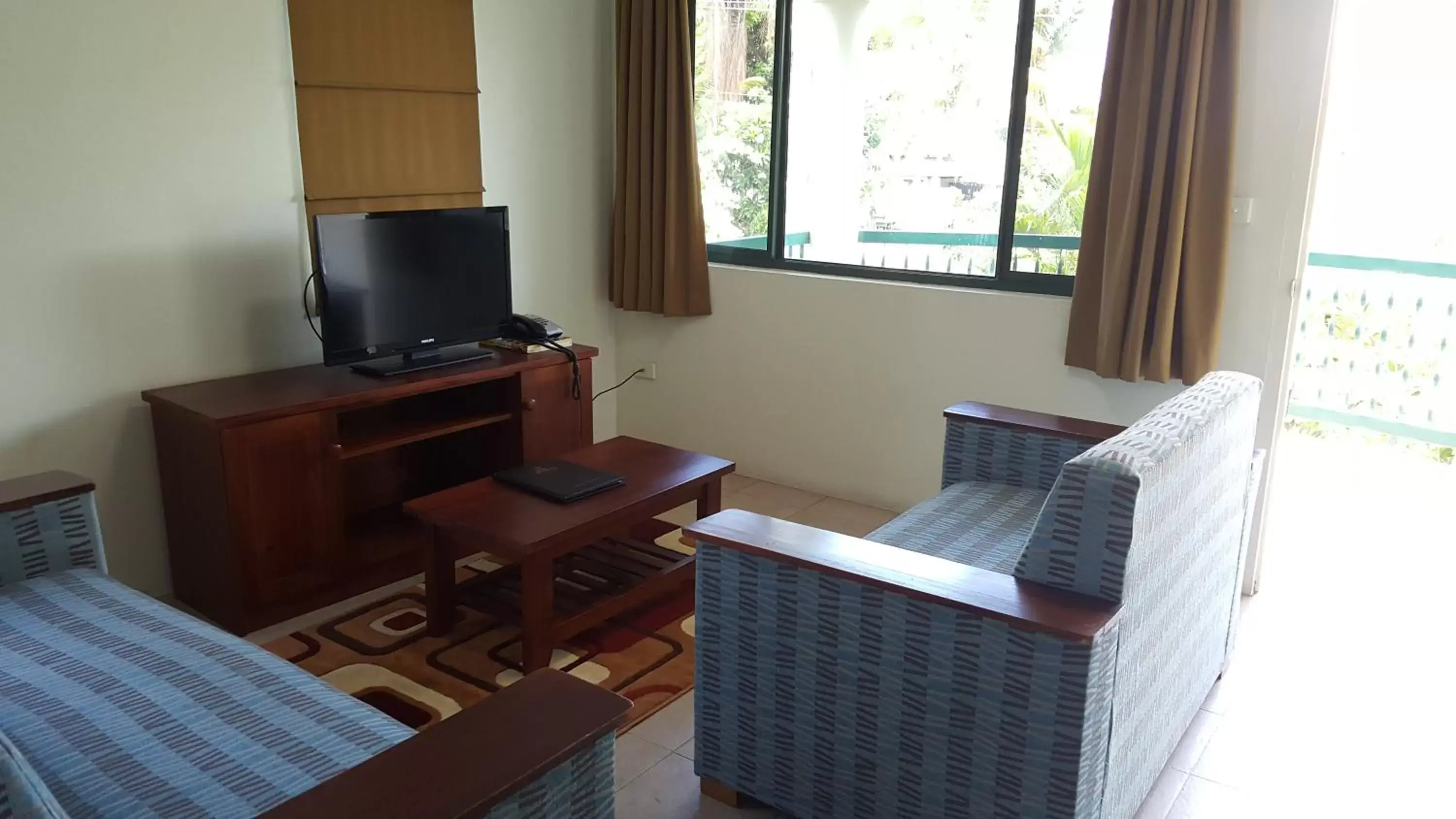 Seating area, TV/Entertainment Center in Hexagon International Hotel, Villas & Spa