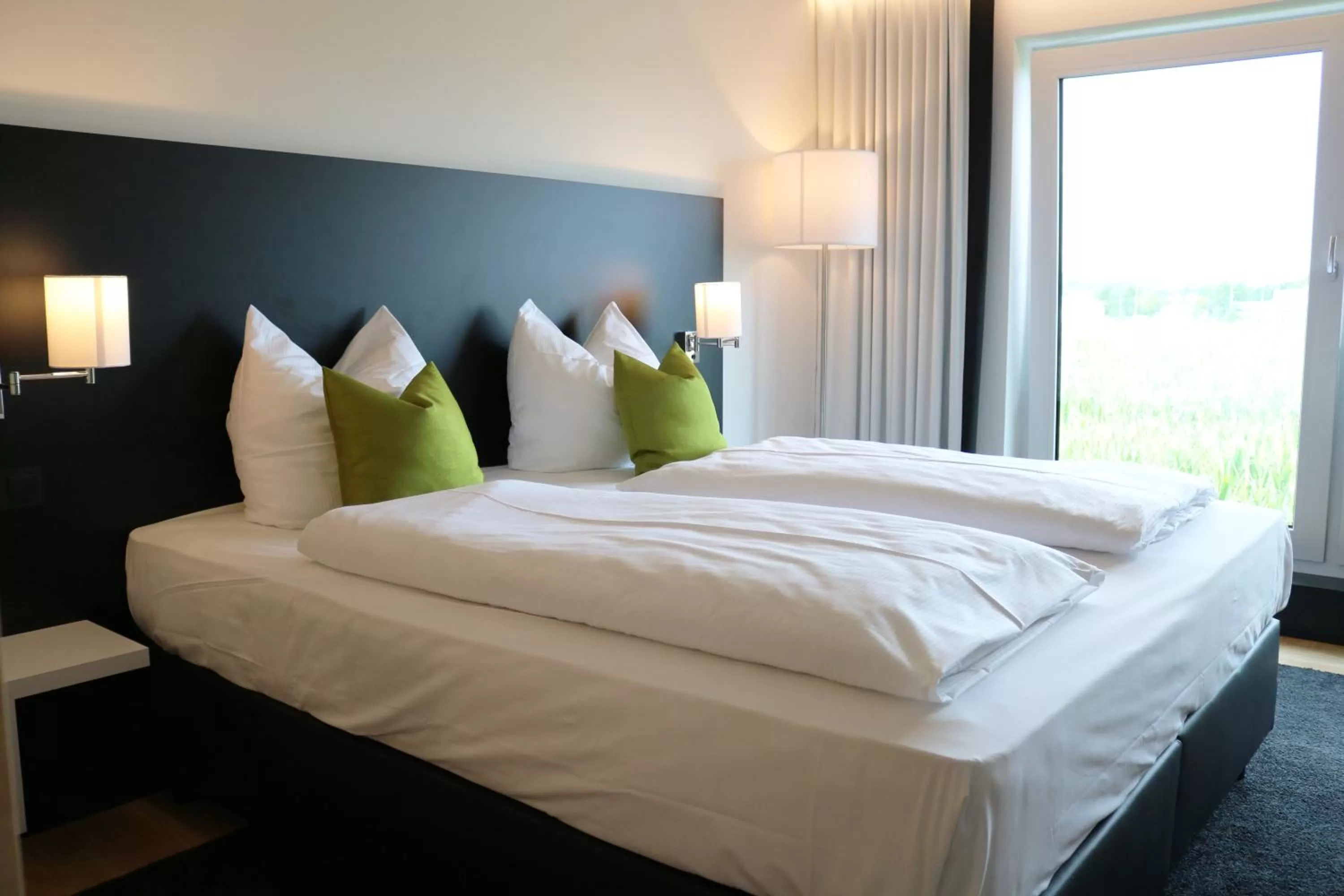 Bed in LH Hotel by WMM Hotels
