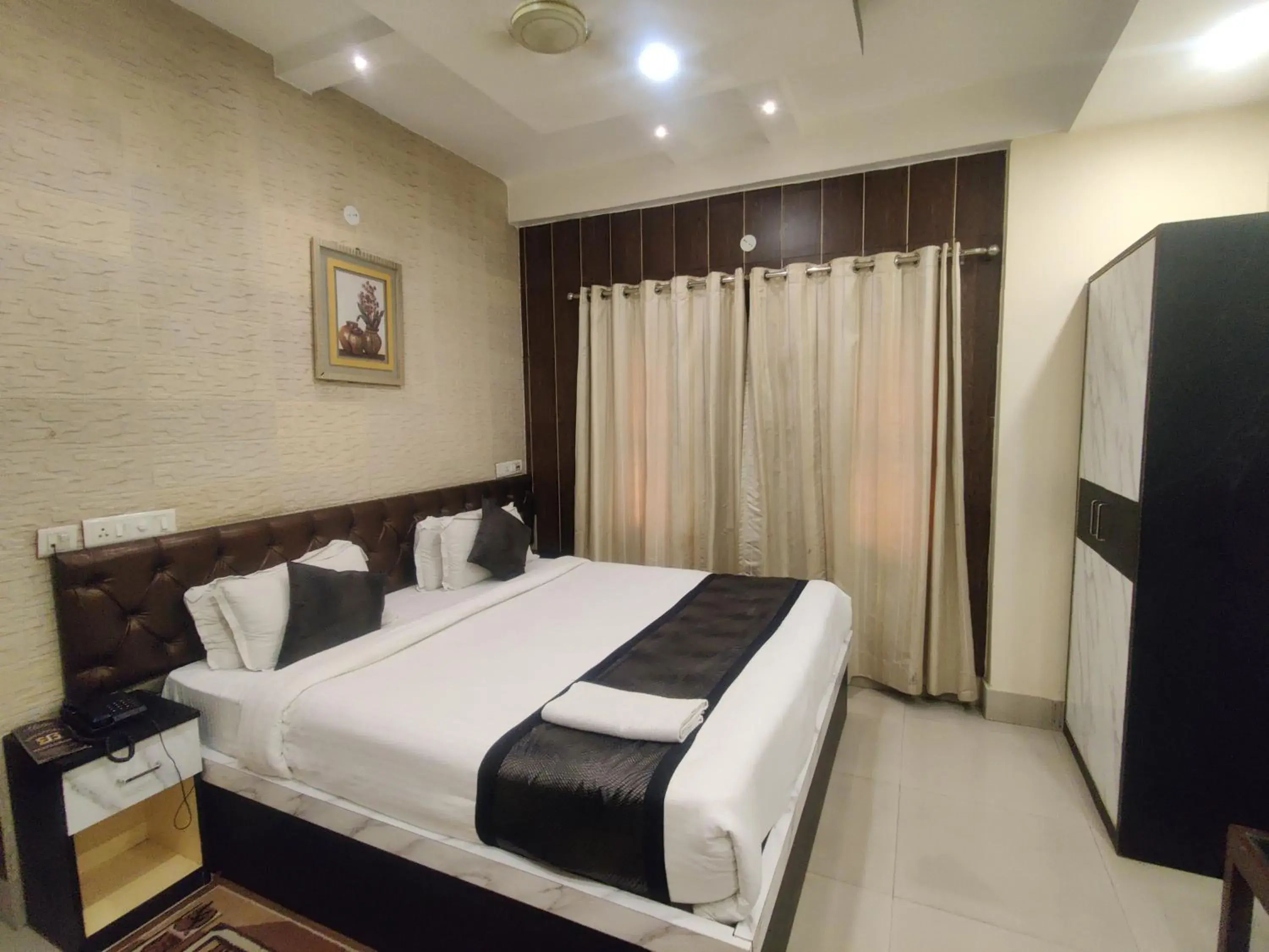 Bed in Hotel Swastik Regency