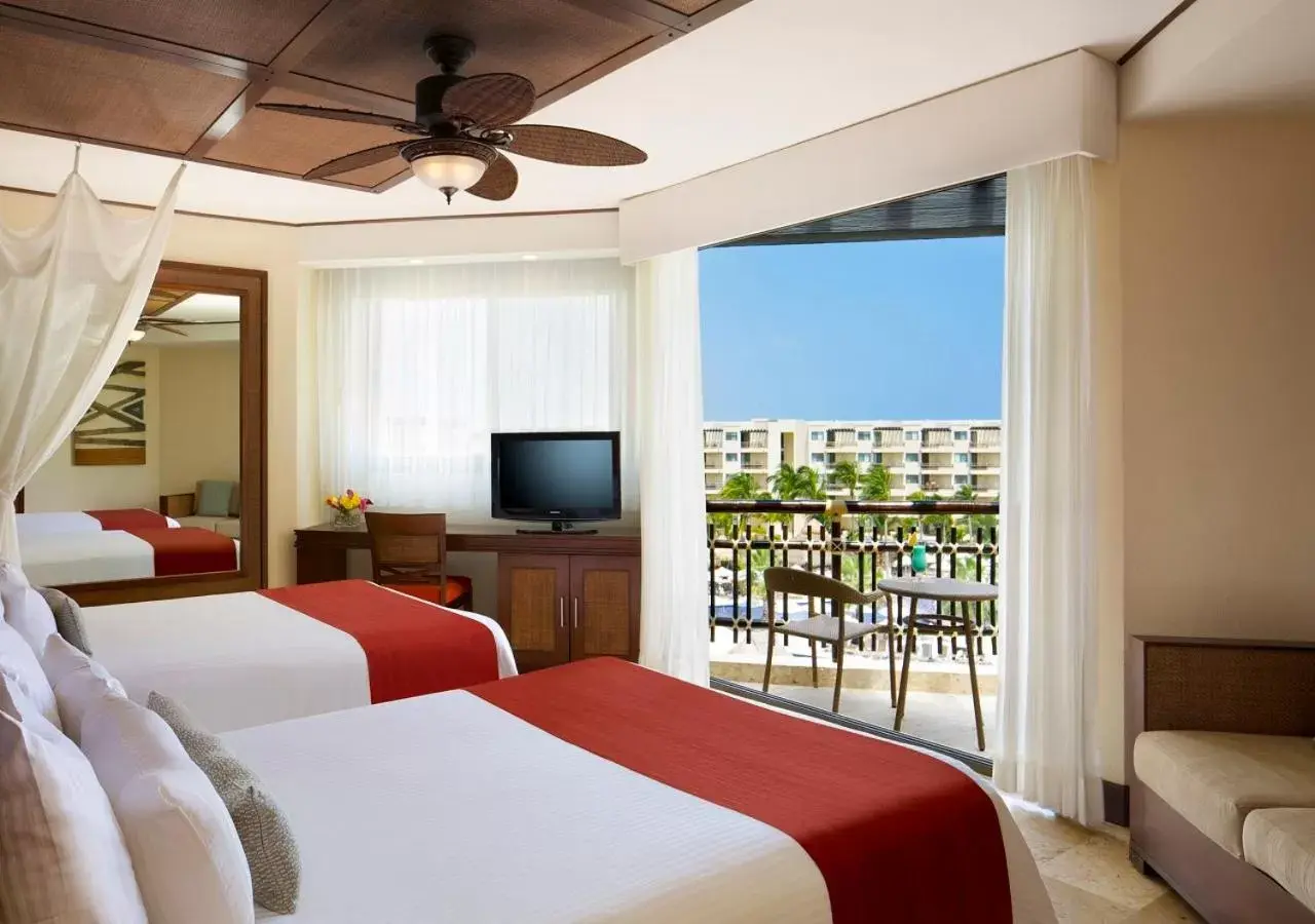 TV and multimedia in Dreams Riviera Cancun Resort & Spa - All Inclusive