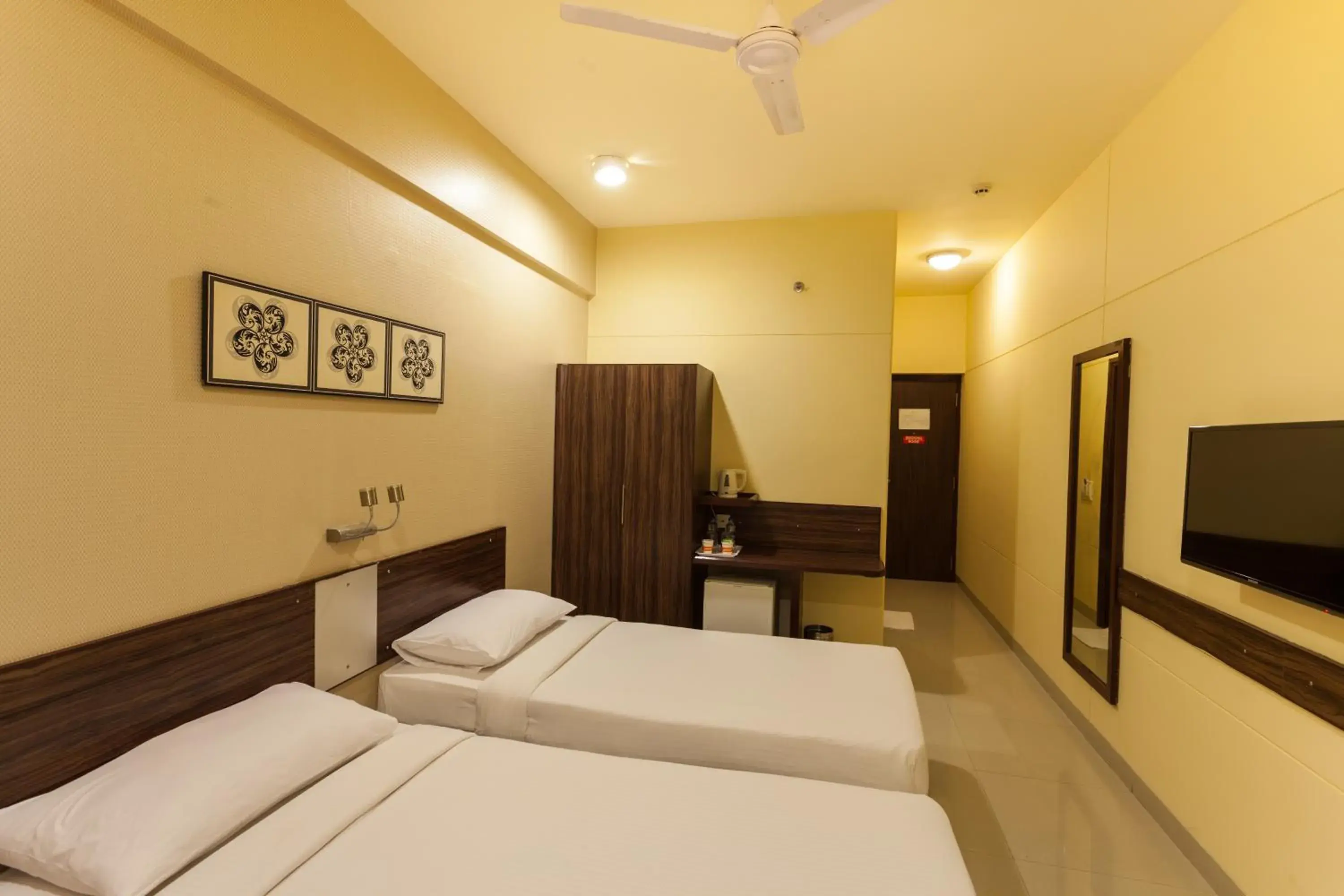 Bedroom, Bed in Ginger Hotel Surat