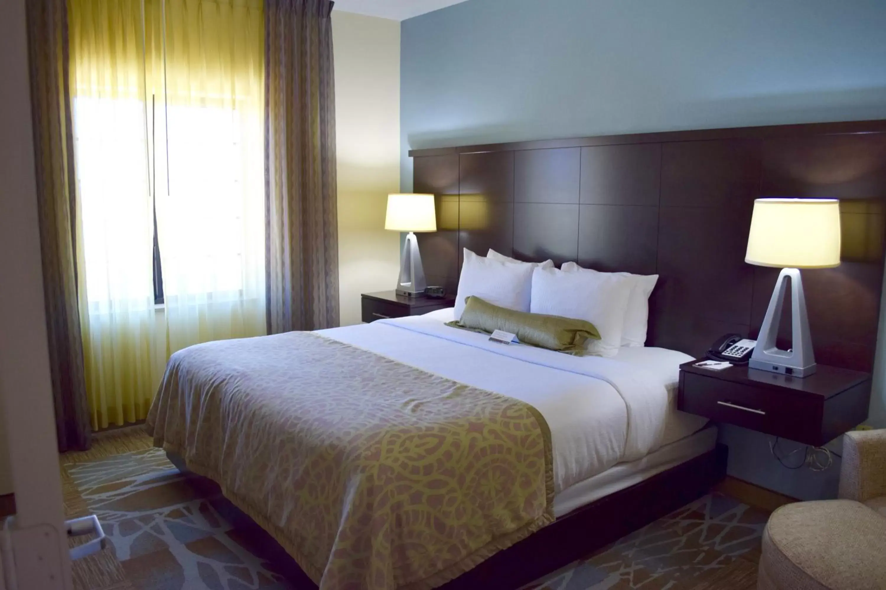 Photo of the whole room, Bed in Staybridge Suites Houston Stafford - Sugar Land, an IHG Hotel