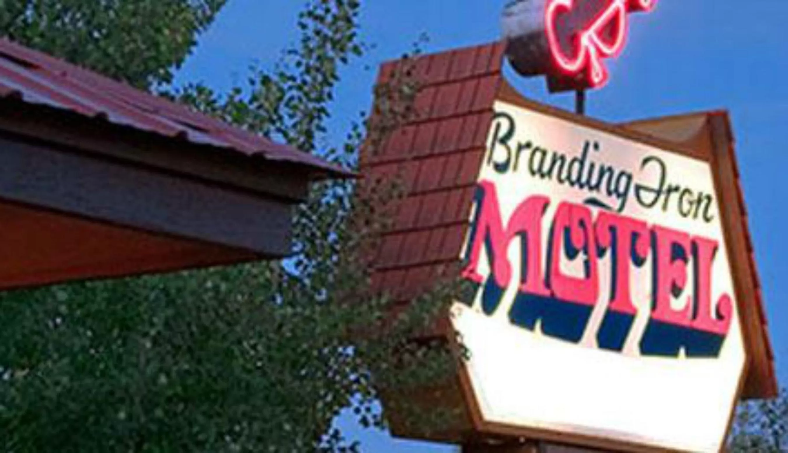 Property logo or sign in Branding Iron Motel