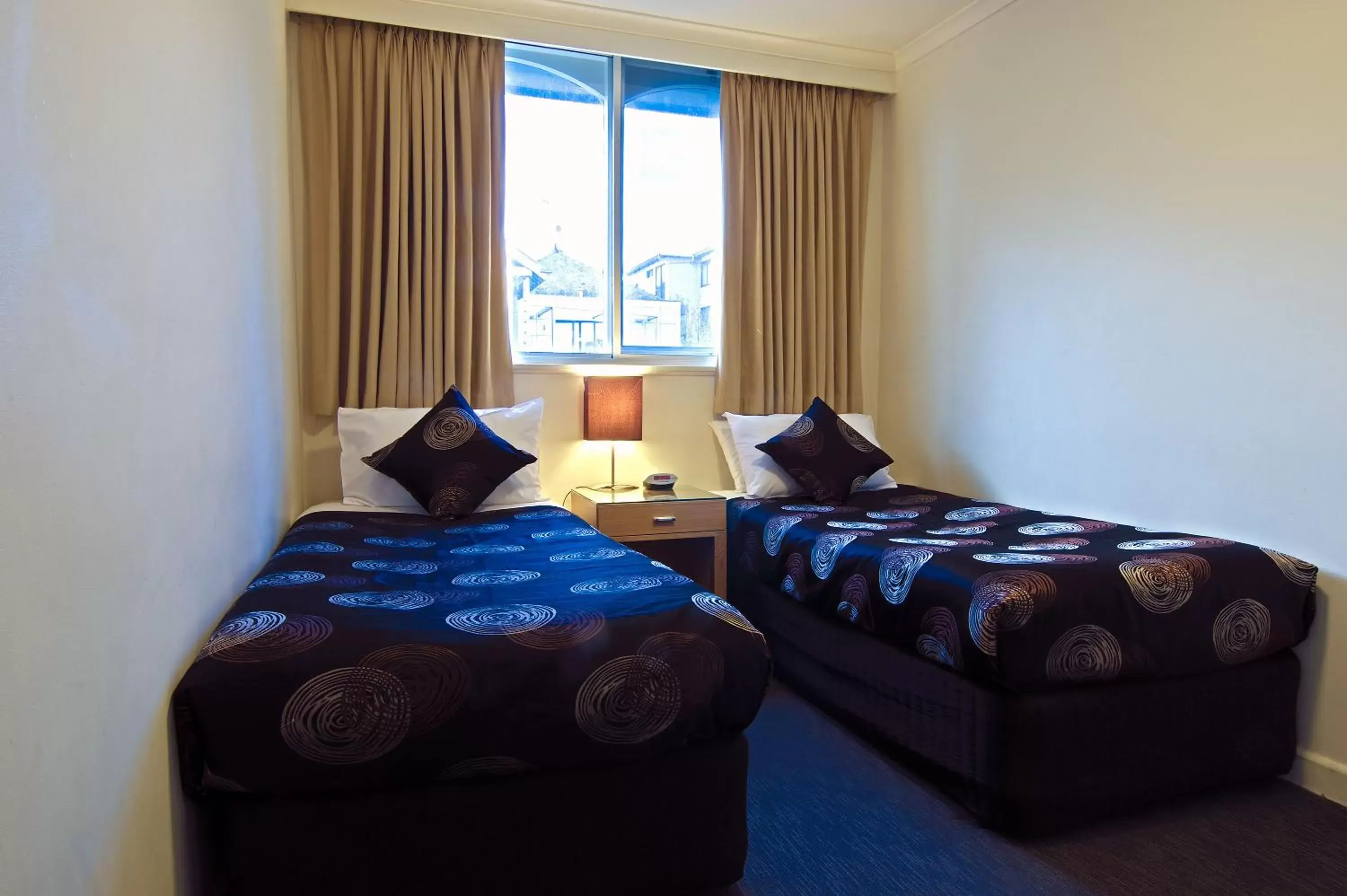 Bedroom, Bed in Park Squire Motor Inn & Serviced Apartments