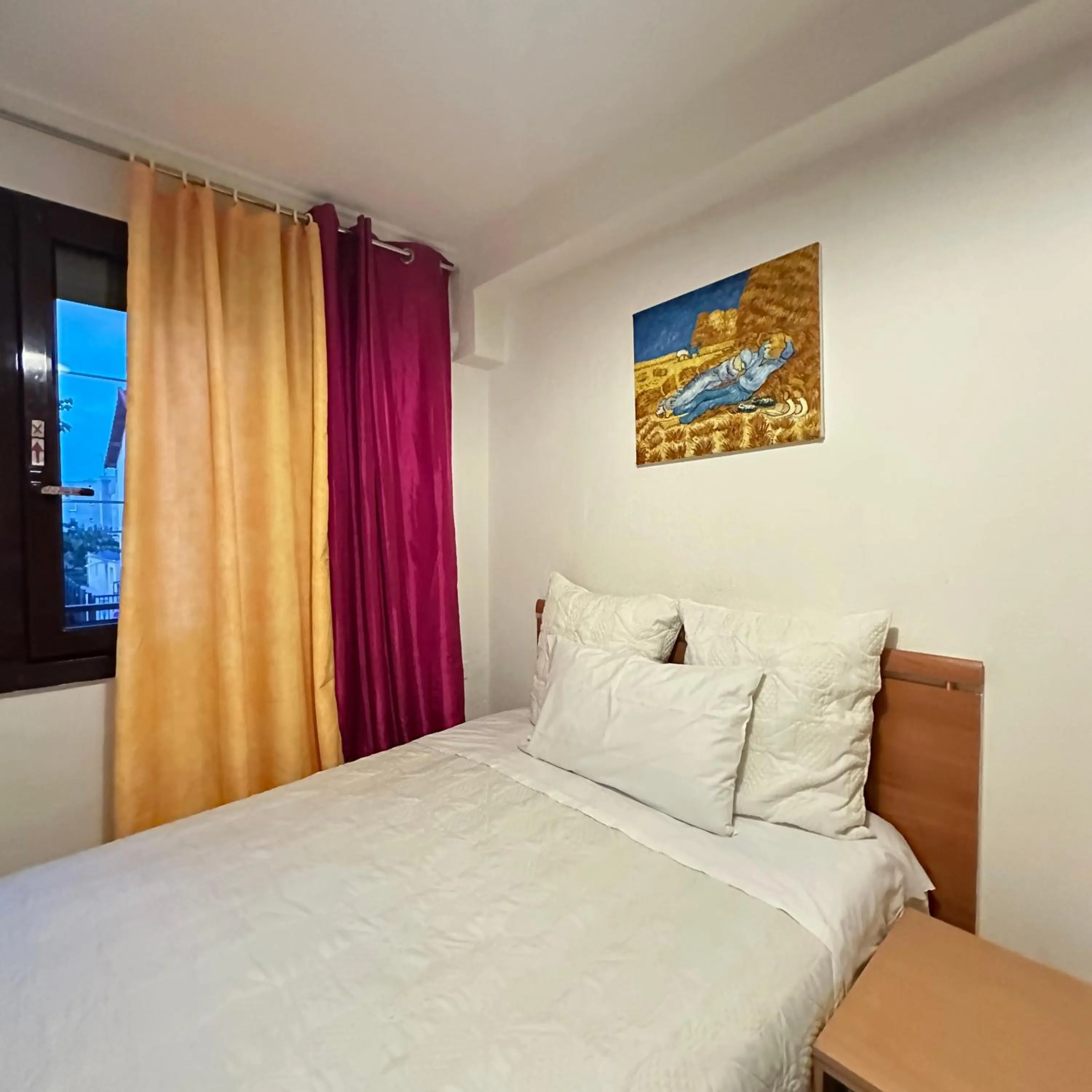 Bed in Hotel Paris Star