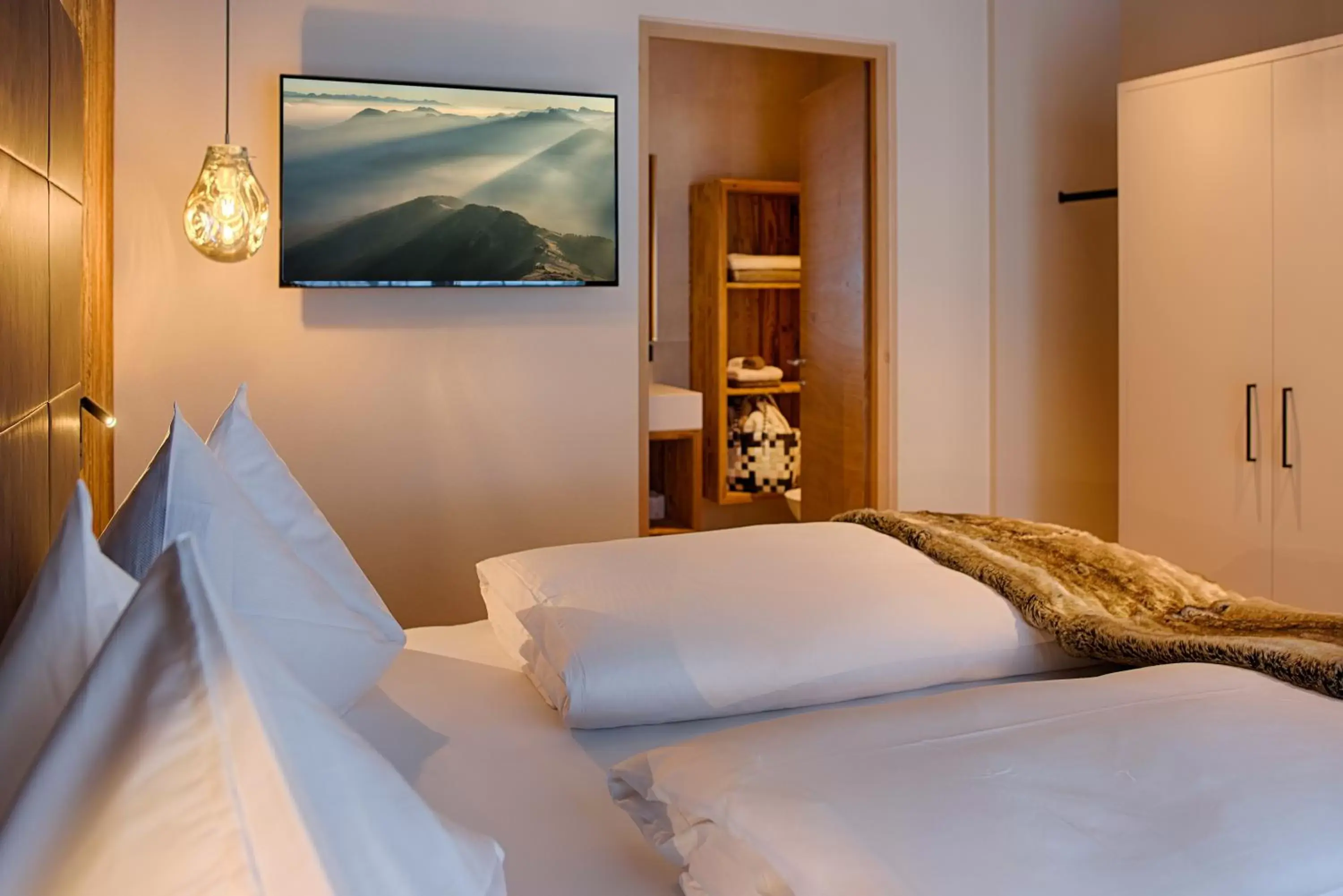 Bed in K1 Mountain Chalet - Luxury Apartements