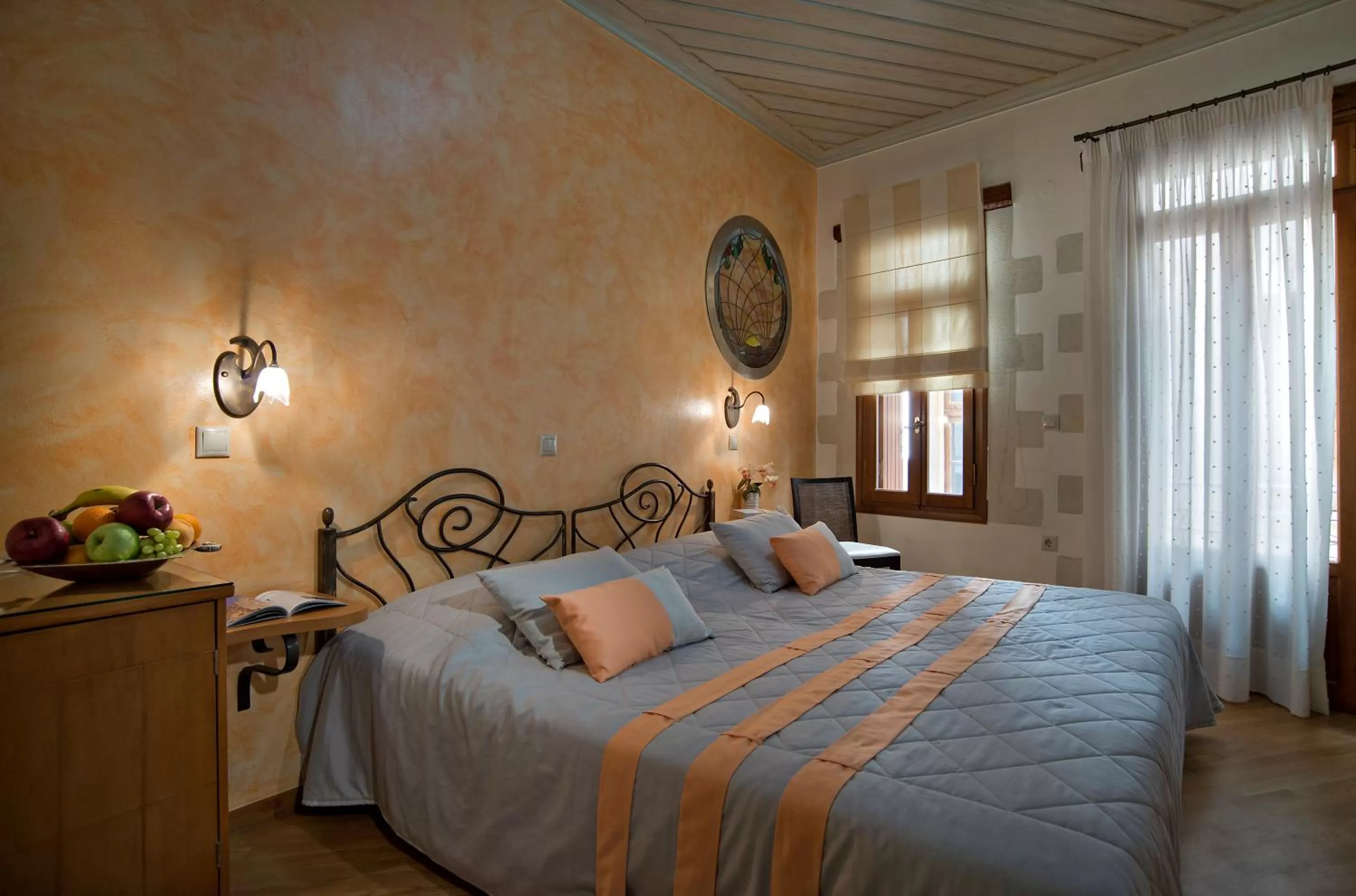 Bed in Ionas Boutique Hotel