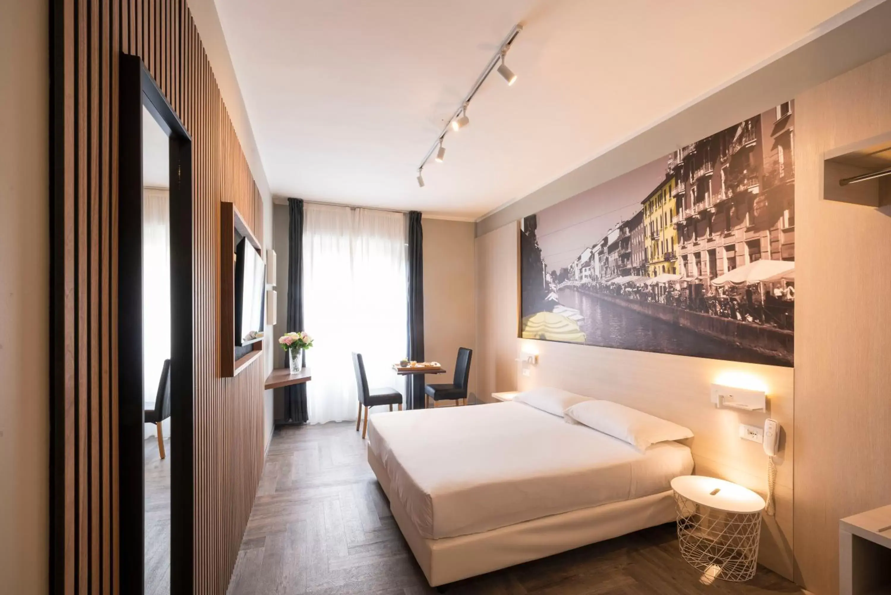 Bed in Kleos Hotel Milano