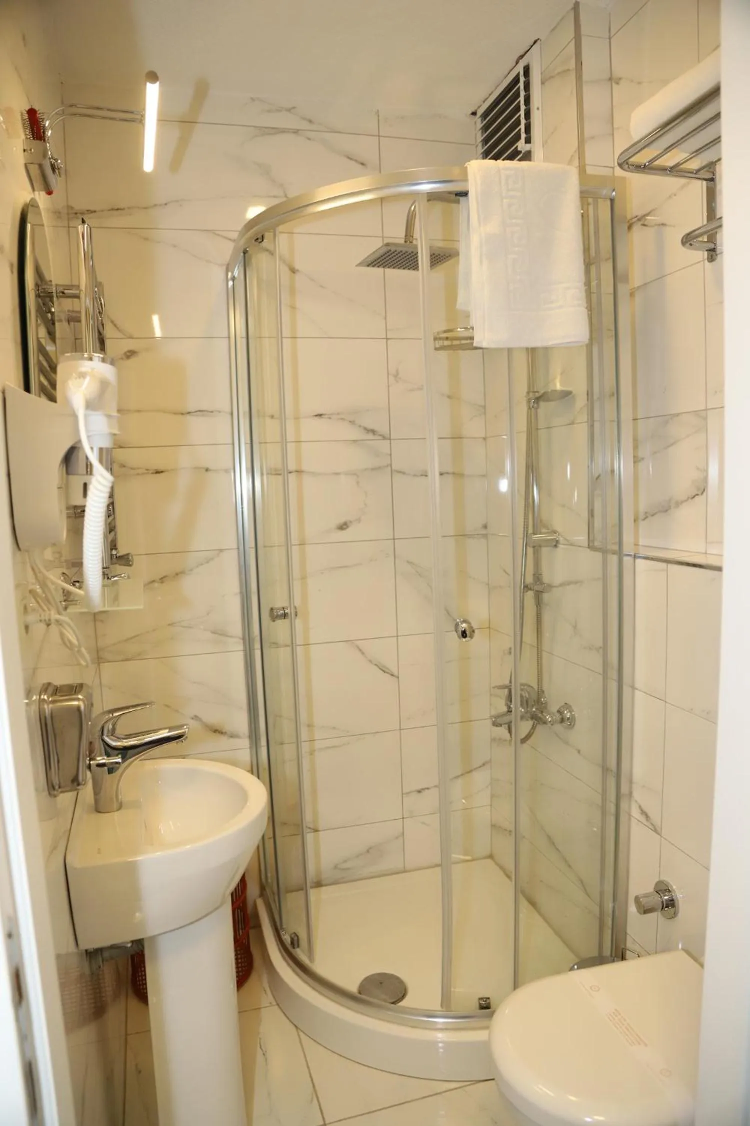 Bathroom in Grand Kavi Hotel