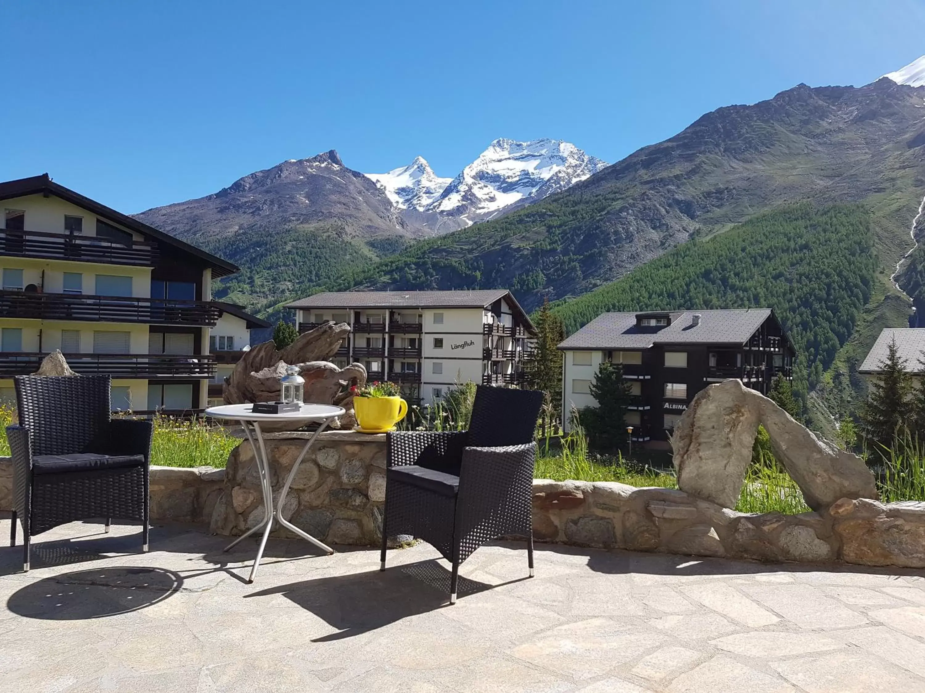 Garden view, Property Building in Hotel Alpenperle