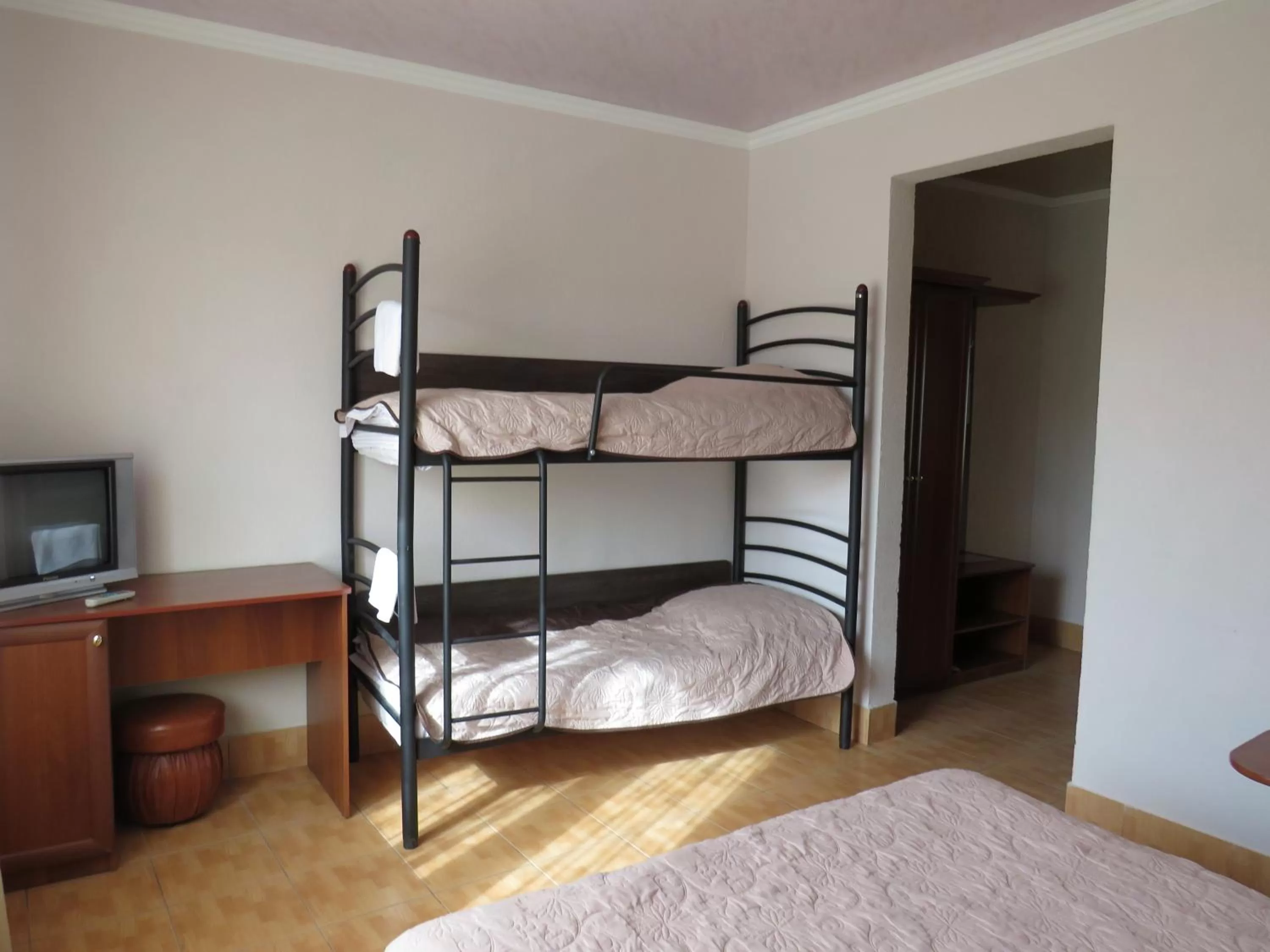 Bed in Monte-Kristo Hotel