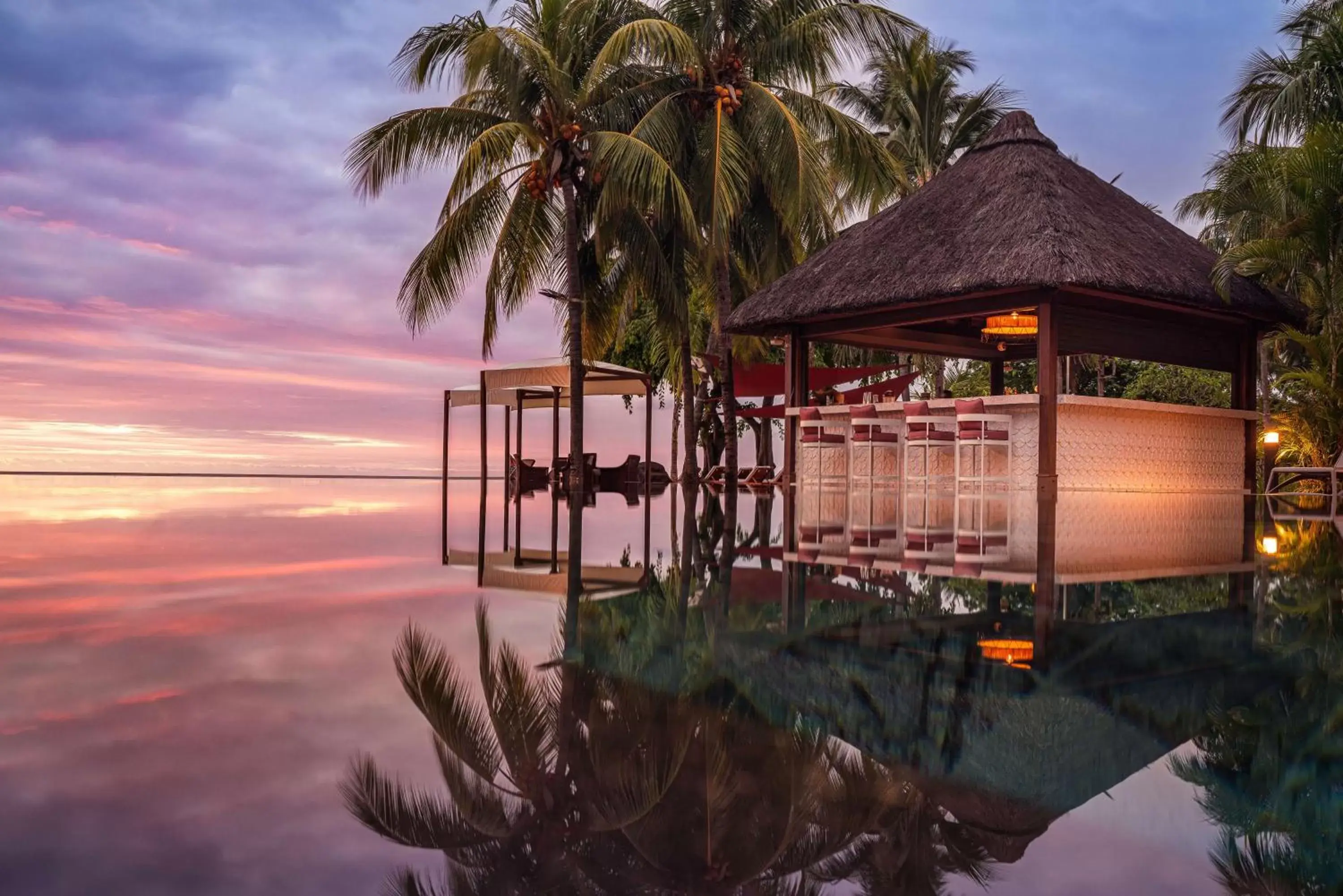 Lounge or bar, Swimming Pool in Hilton Mauritius Resort & Spa