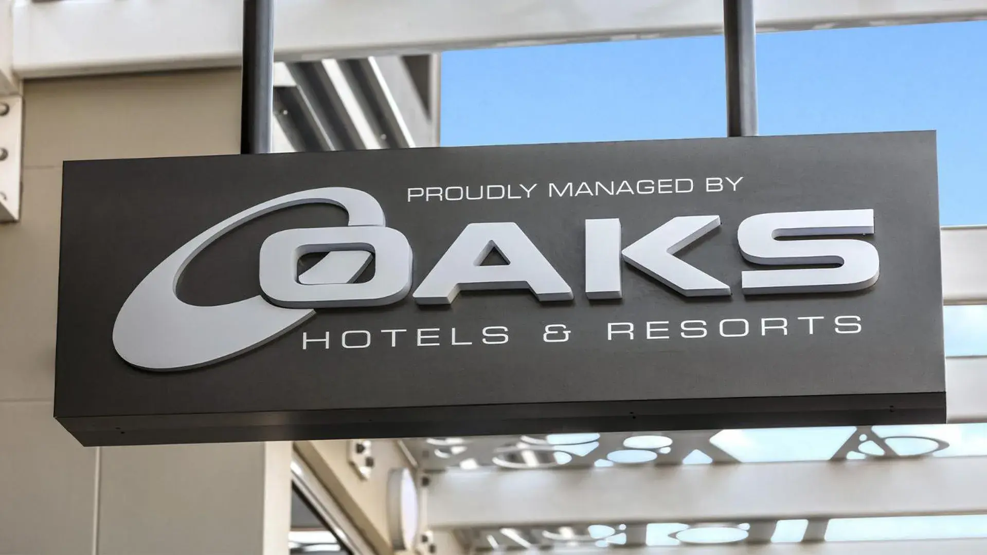 Property logo or sign in Oaks Brisbane Woolloongabba Suites