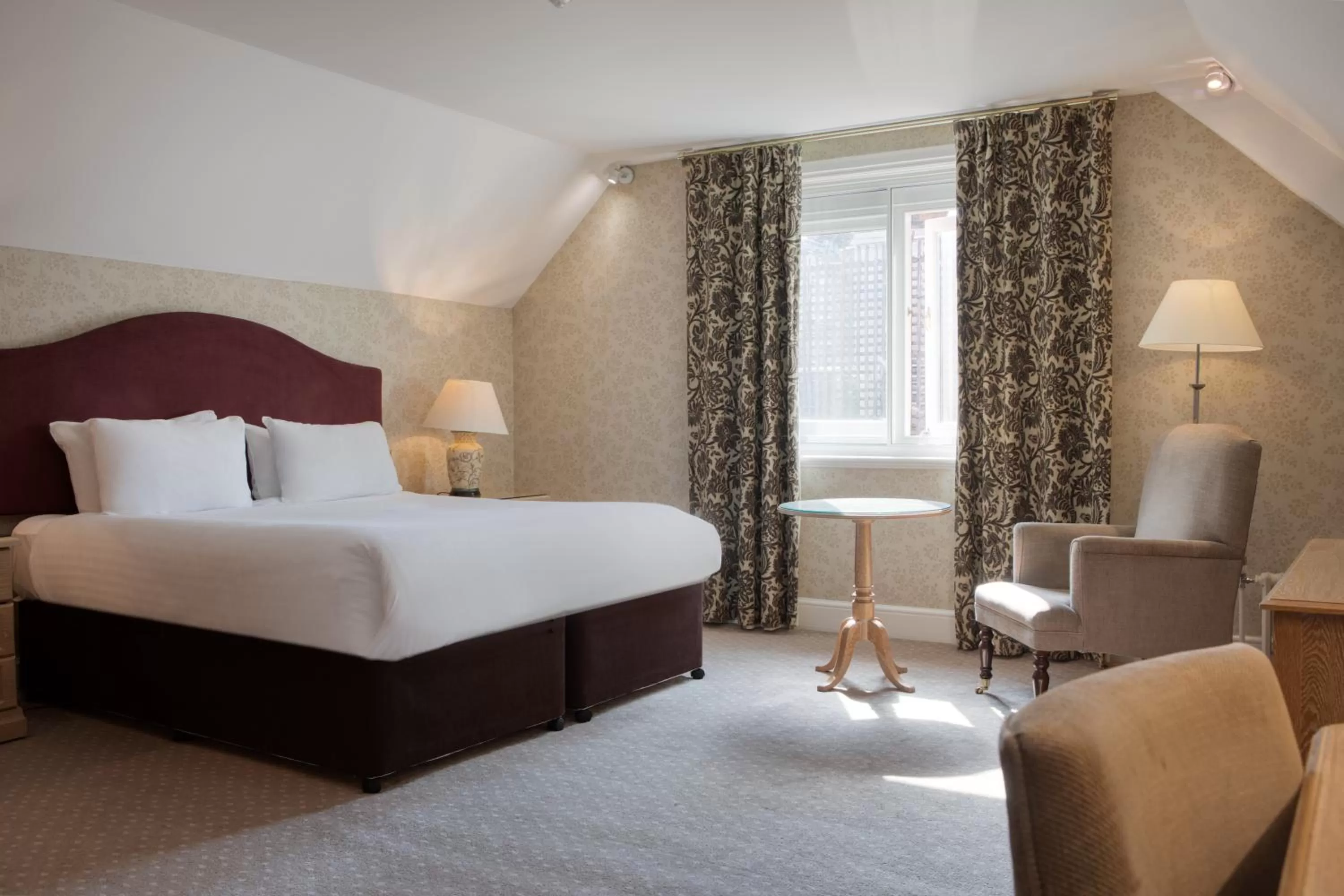 Bed in The Welcombe Golf & Spa Hotel