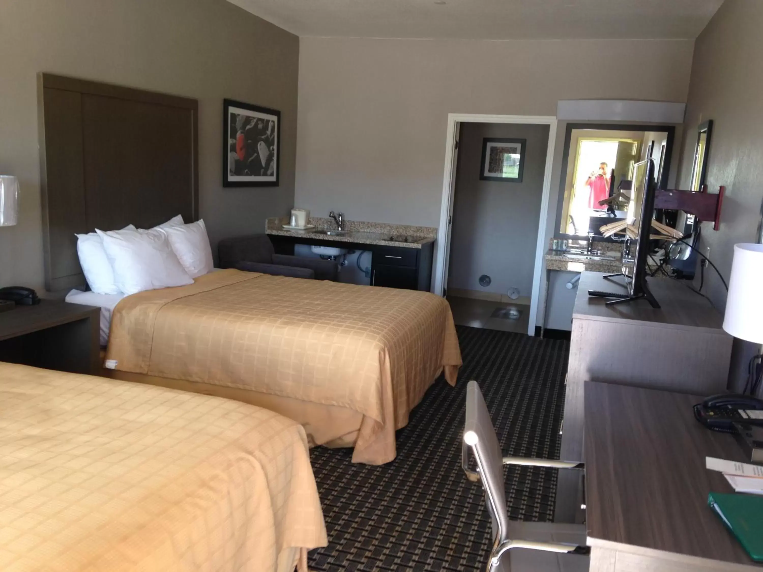 Photo of the whole room, Bed in Scottish Inn & Suites Cotulla, TX Photo of the whole room, Bed in Scottish Inn & Suites Cotulla, TX