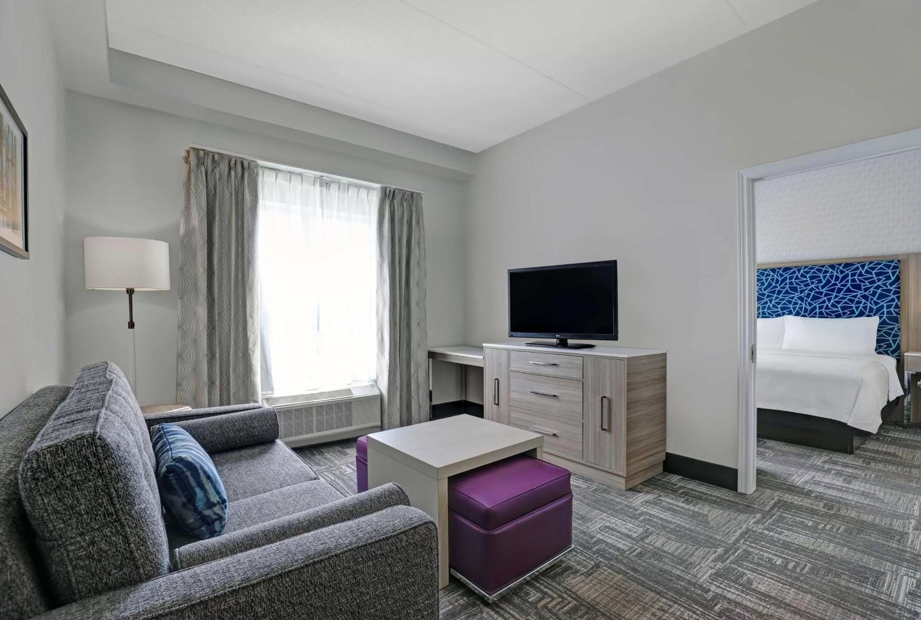 Living room, Bed in Homewood Suites by Hilton London Ontario