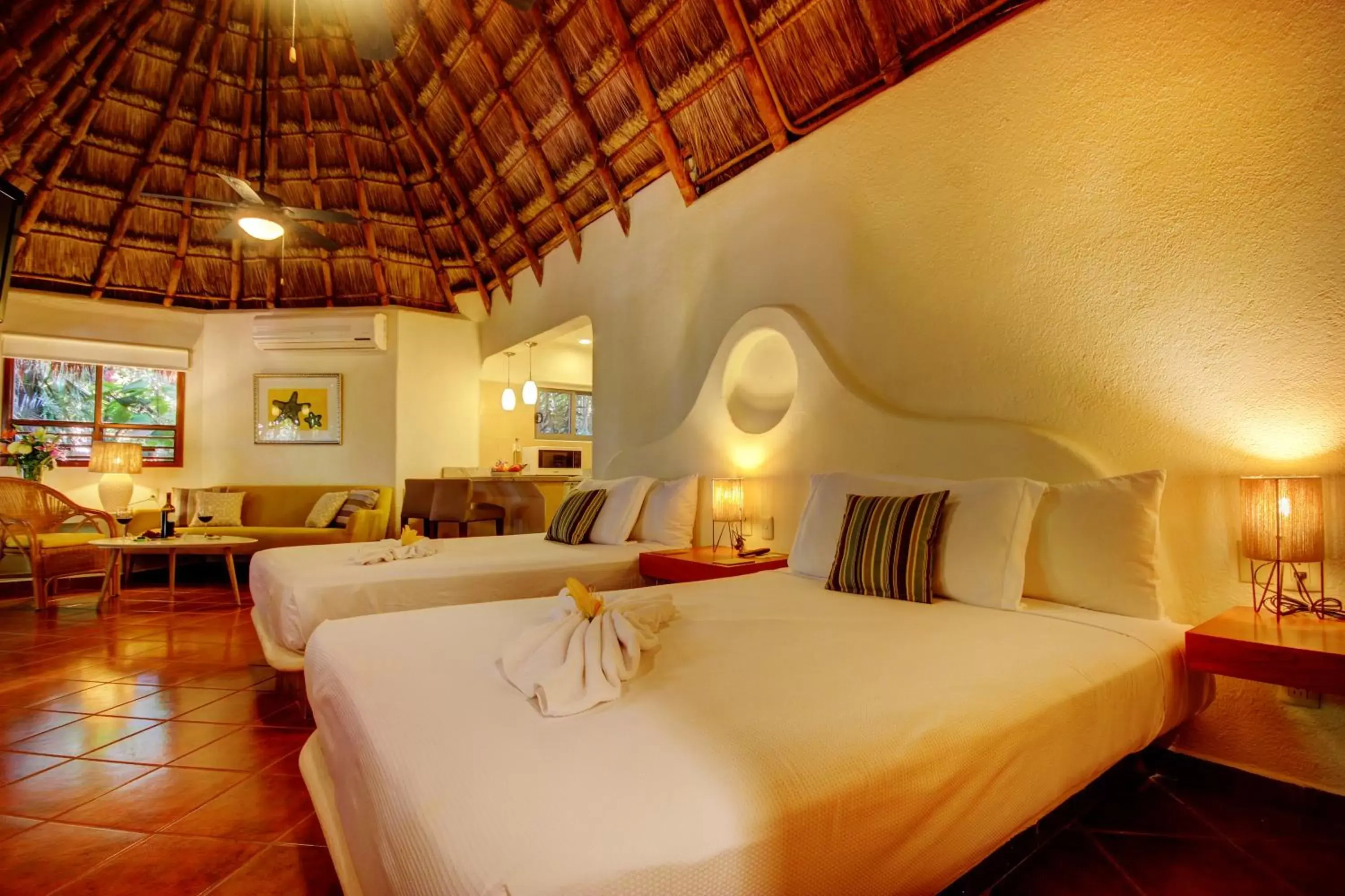 Bed in Riviera Maya Suites