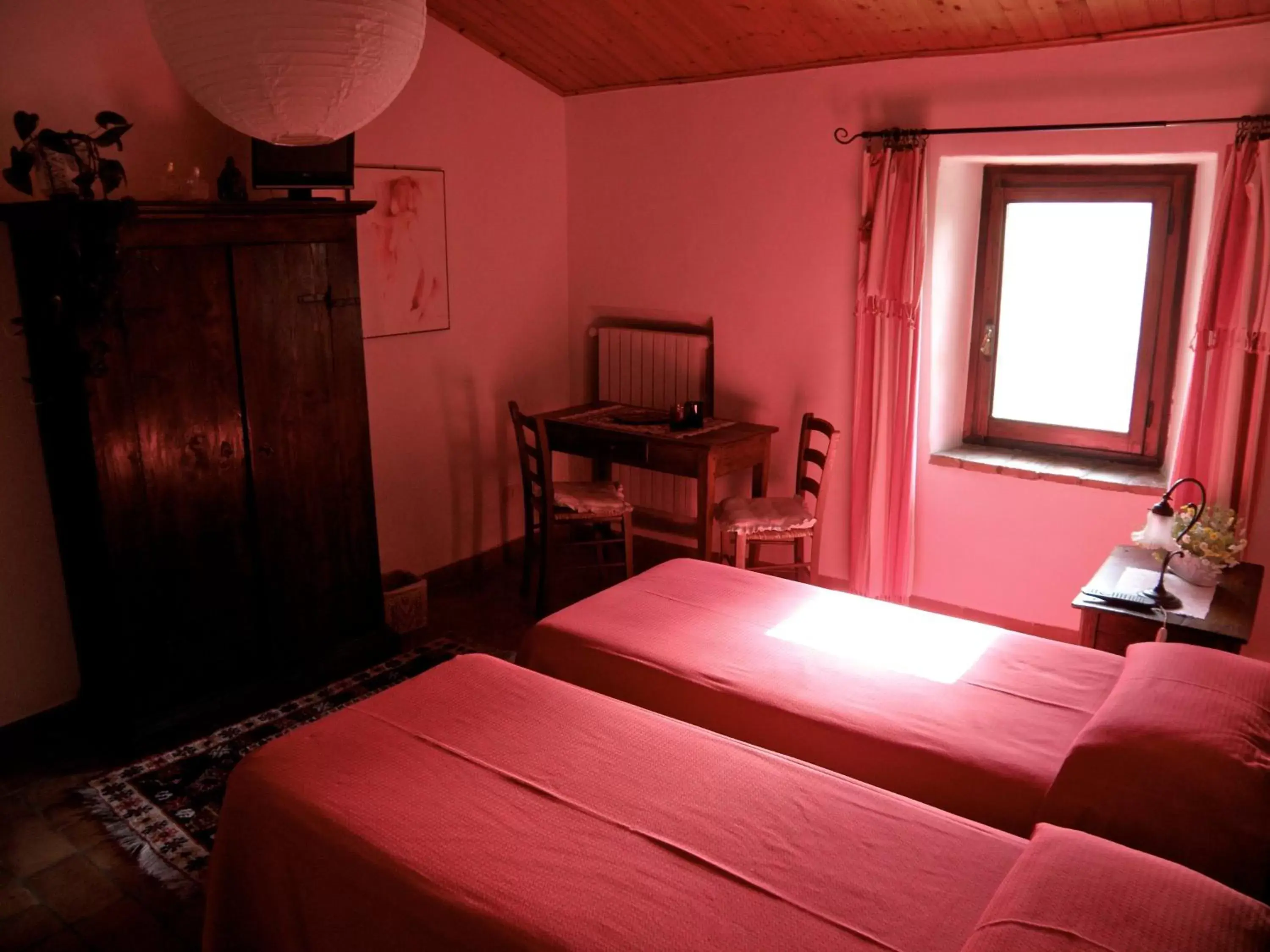 Photo of the whole room, Bed in Podere Pinzicalari