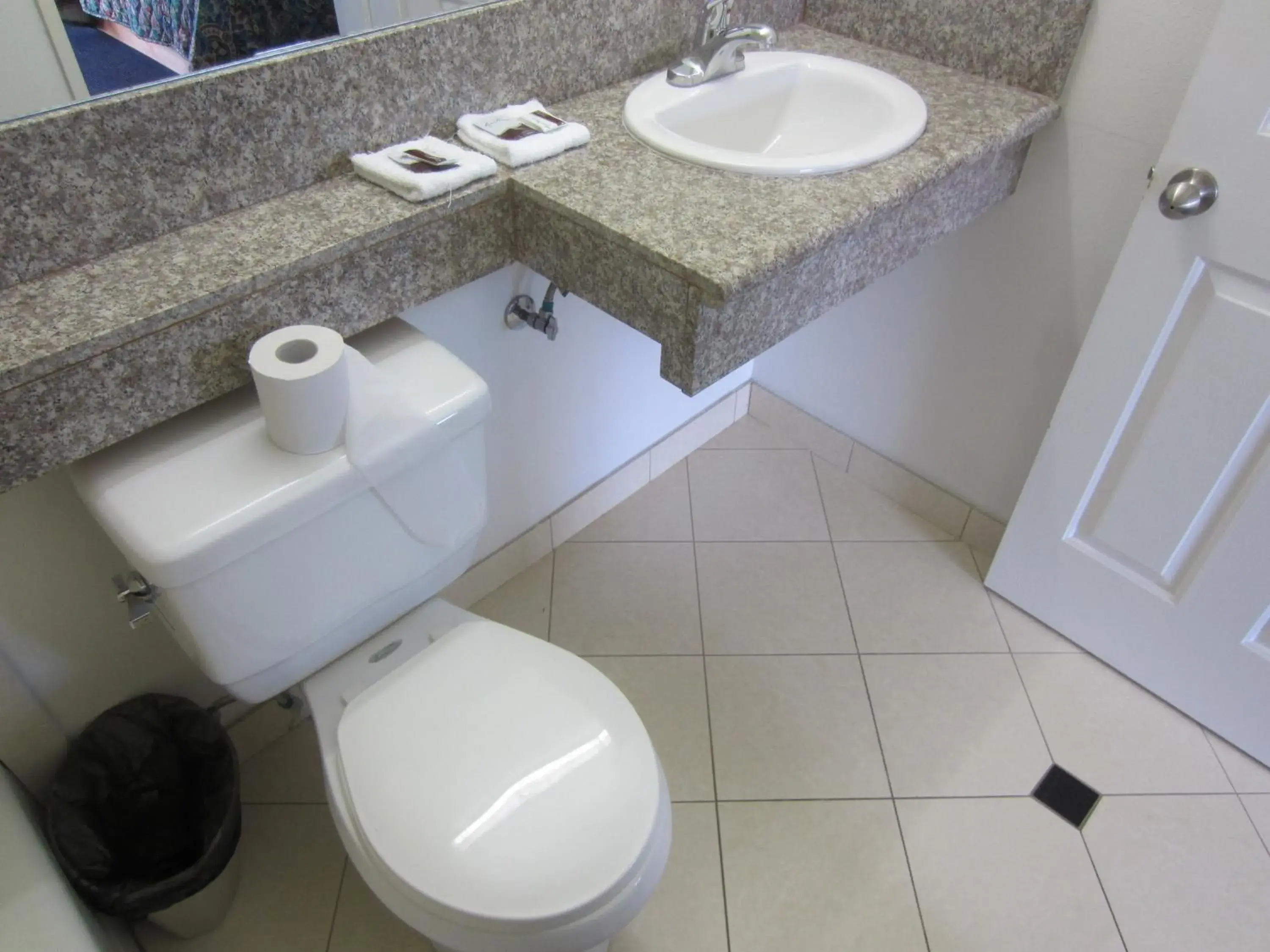 Toilet, Bathroom in Starlight Inn Van Nuys