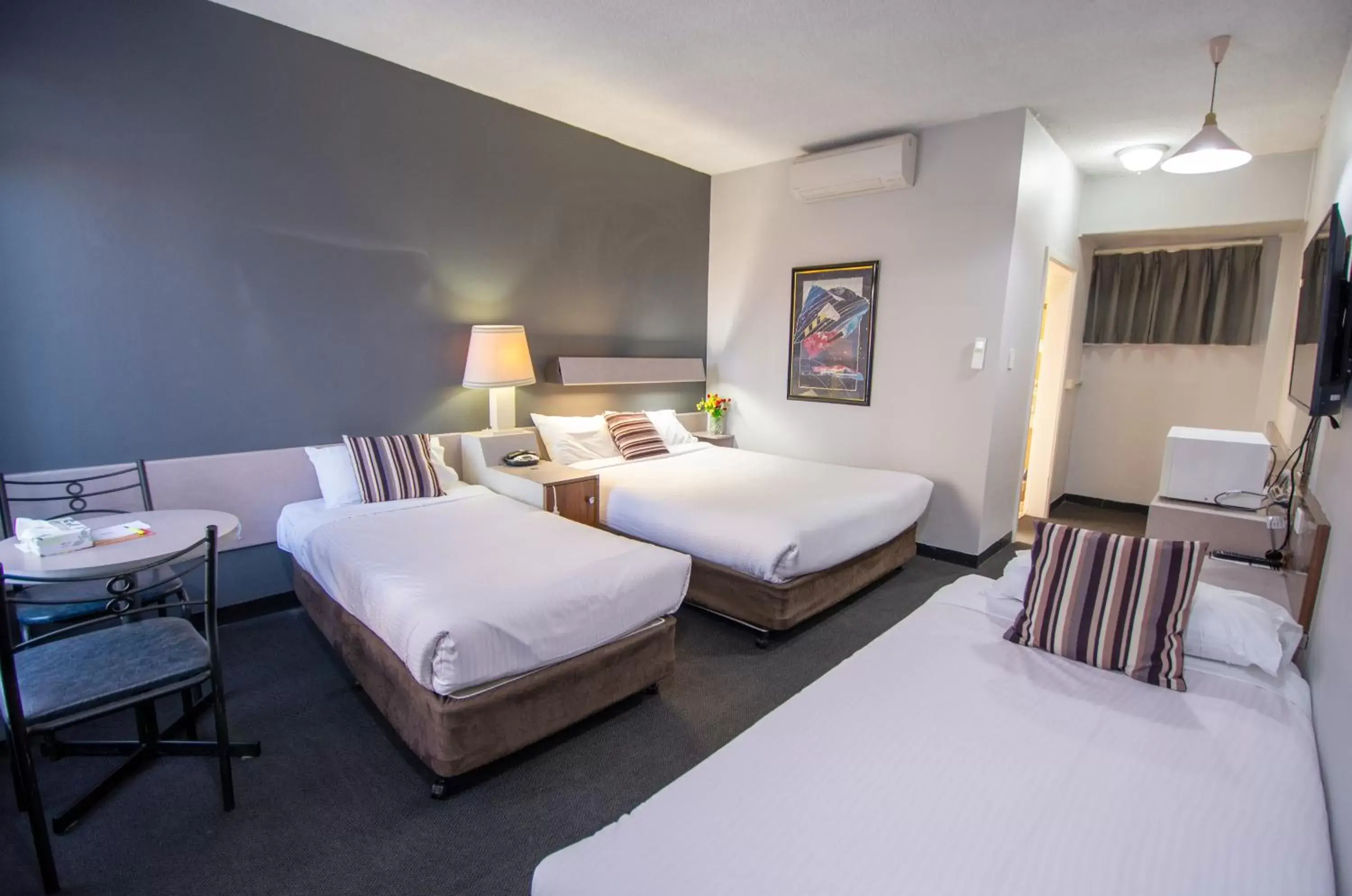 Bed in The Midcity Motor Lodge Bed in The Midcity Motor Lodge