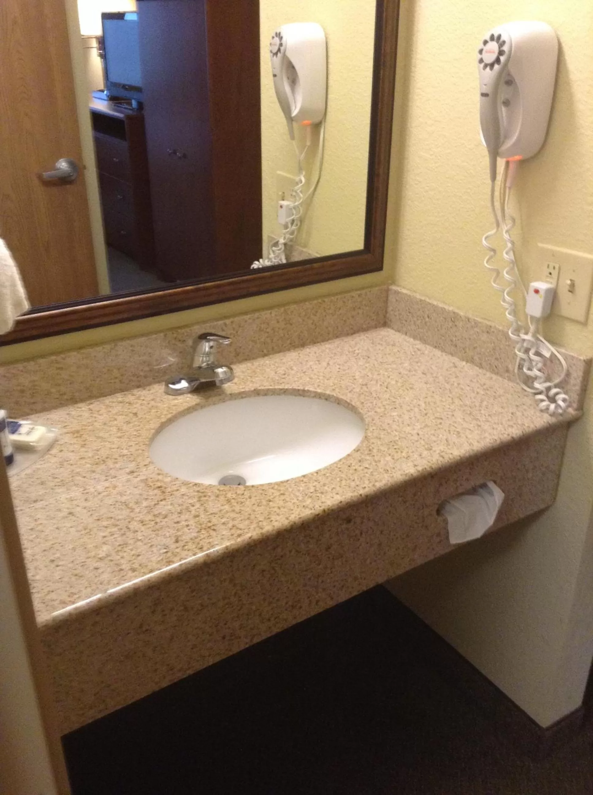 Bathroom in AmericInn by Wyndham Newton