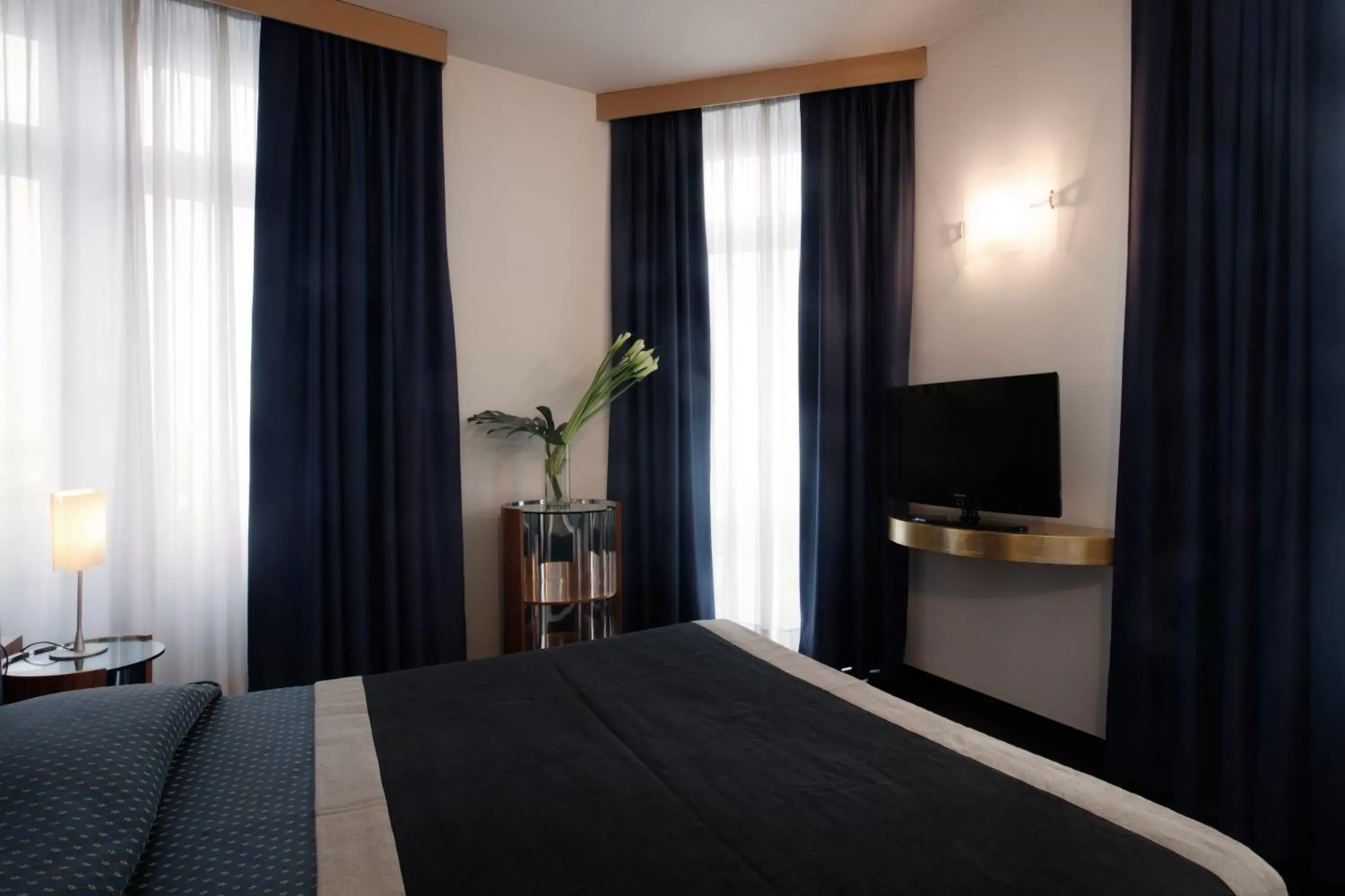Bed, TV/Entertainment Center in Hotel Grand'Italia