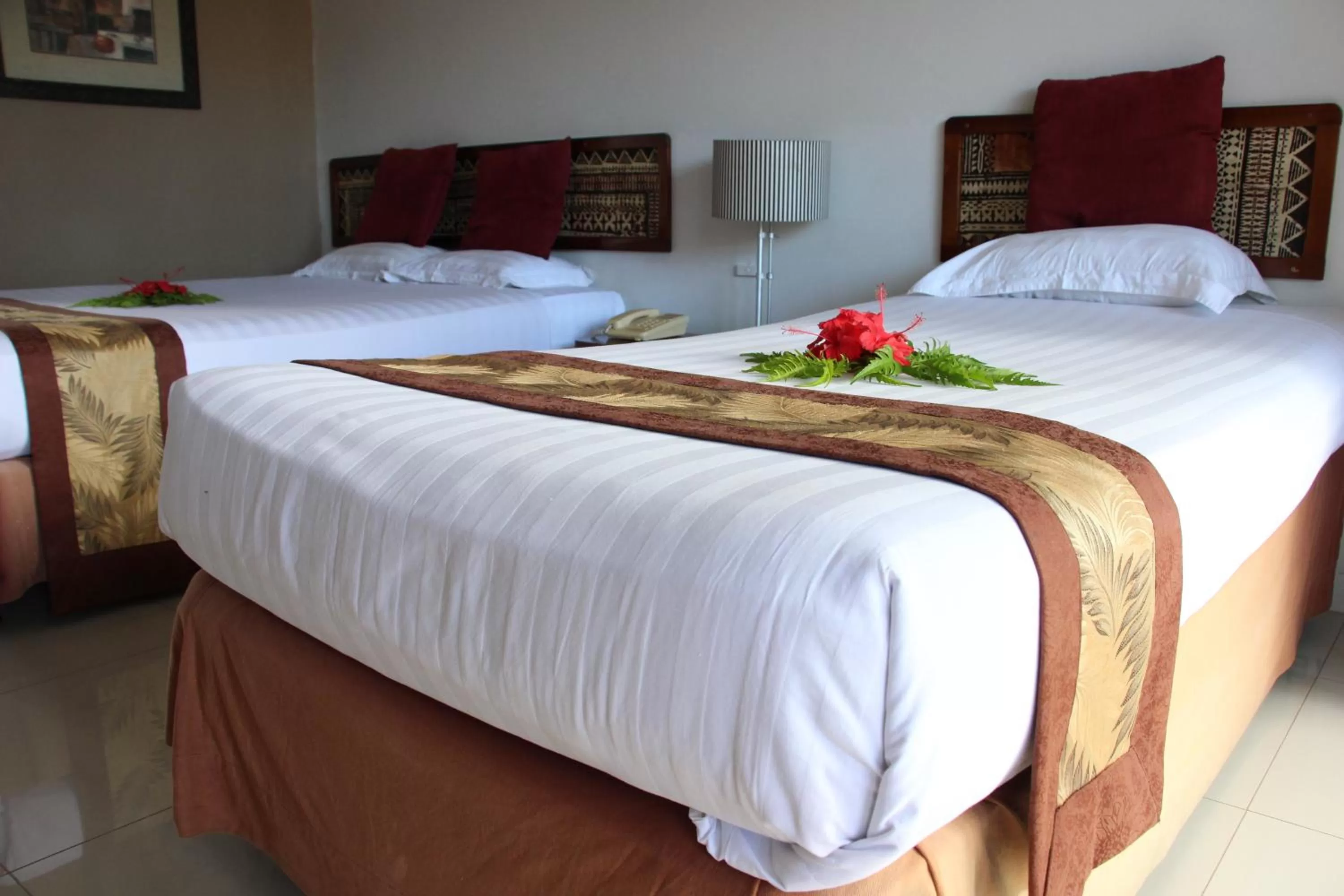 Bed in Capricorn International Hotel