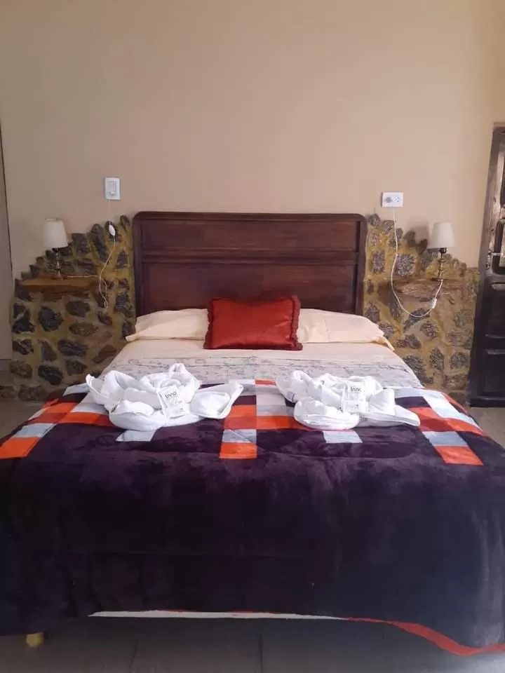 Bed in Hotel Hacienda Casa Blanca