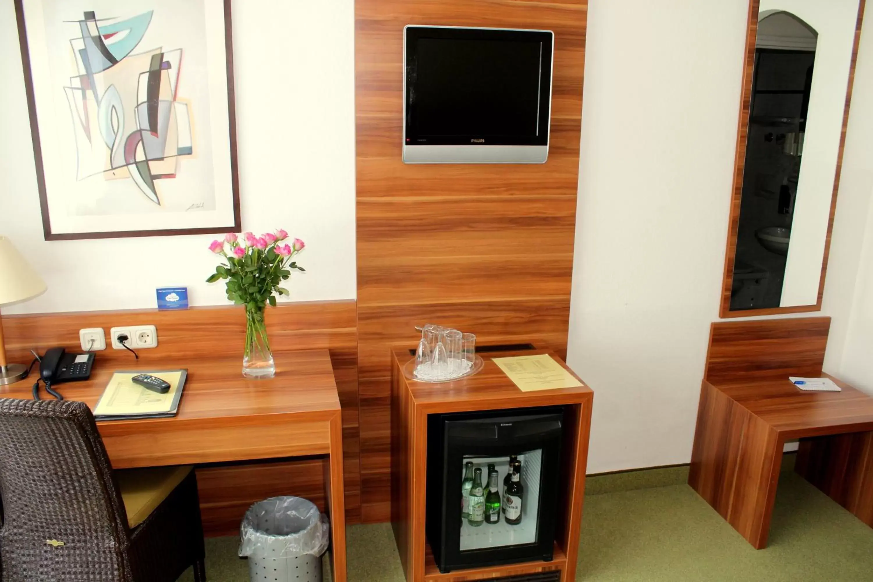 TV and multimedia, TV/Entertainment Center in Hotel Wallis