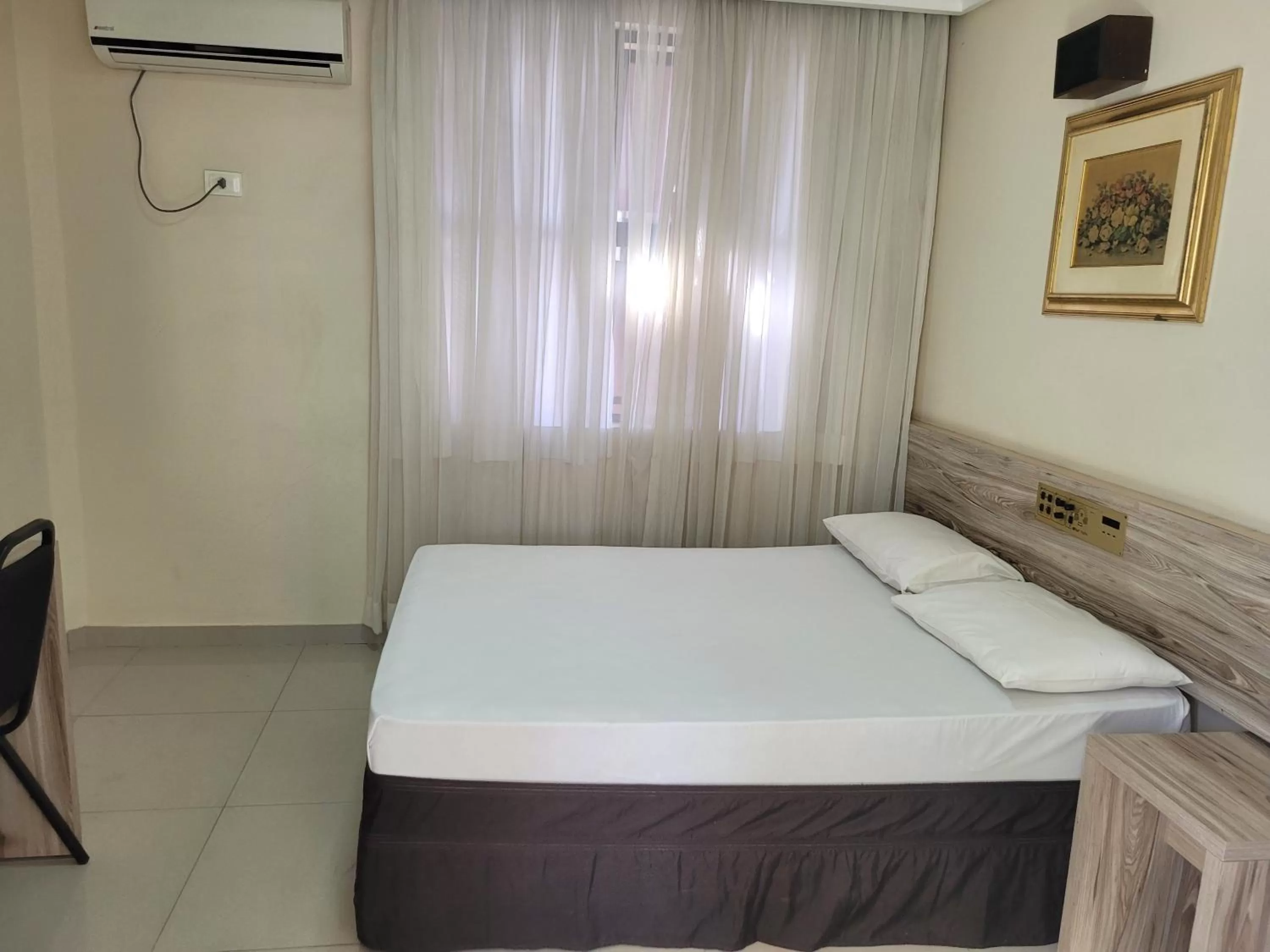 Bed in Hotel Estação Express