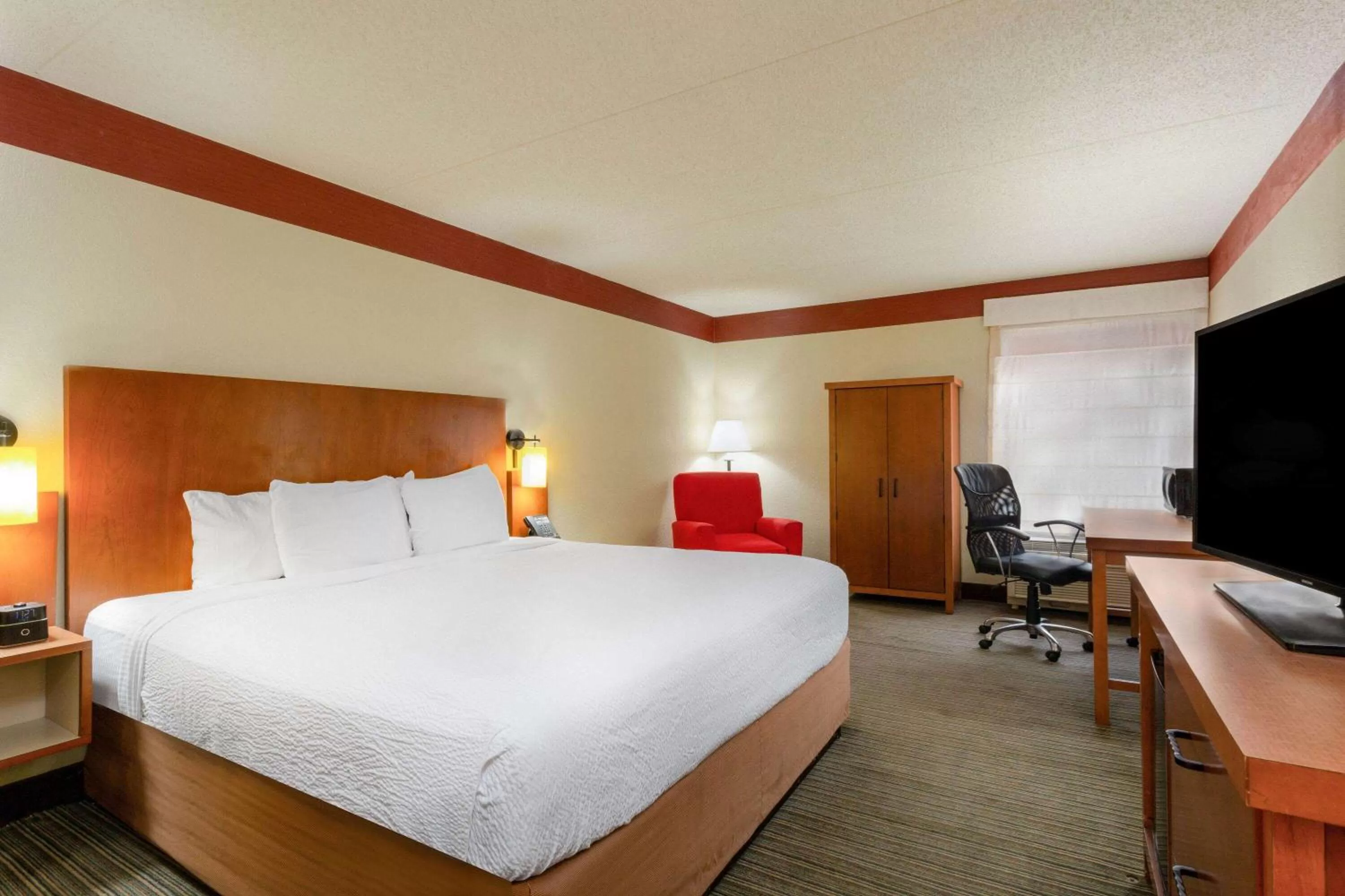 Photo of the whole room, Bed in CLT Airport Inn & Suites