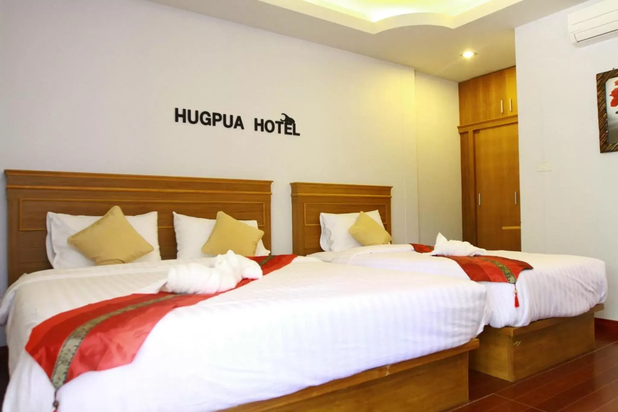 Bed in Hugpua Hotel