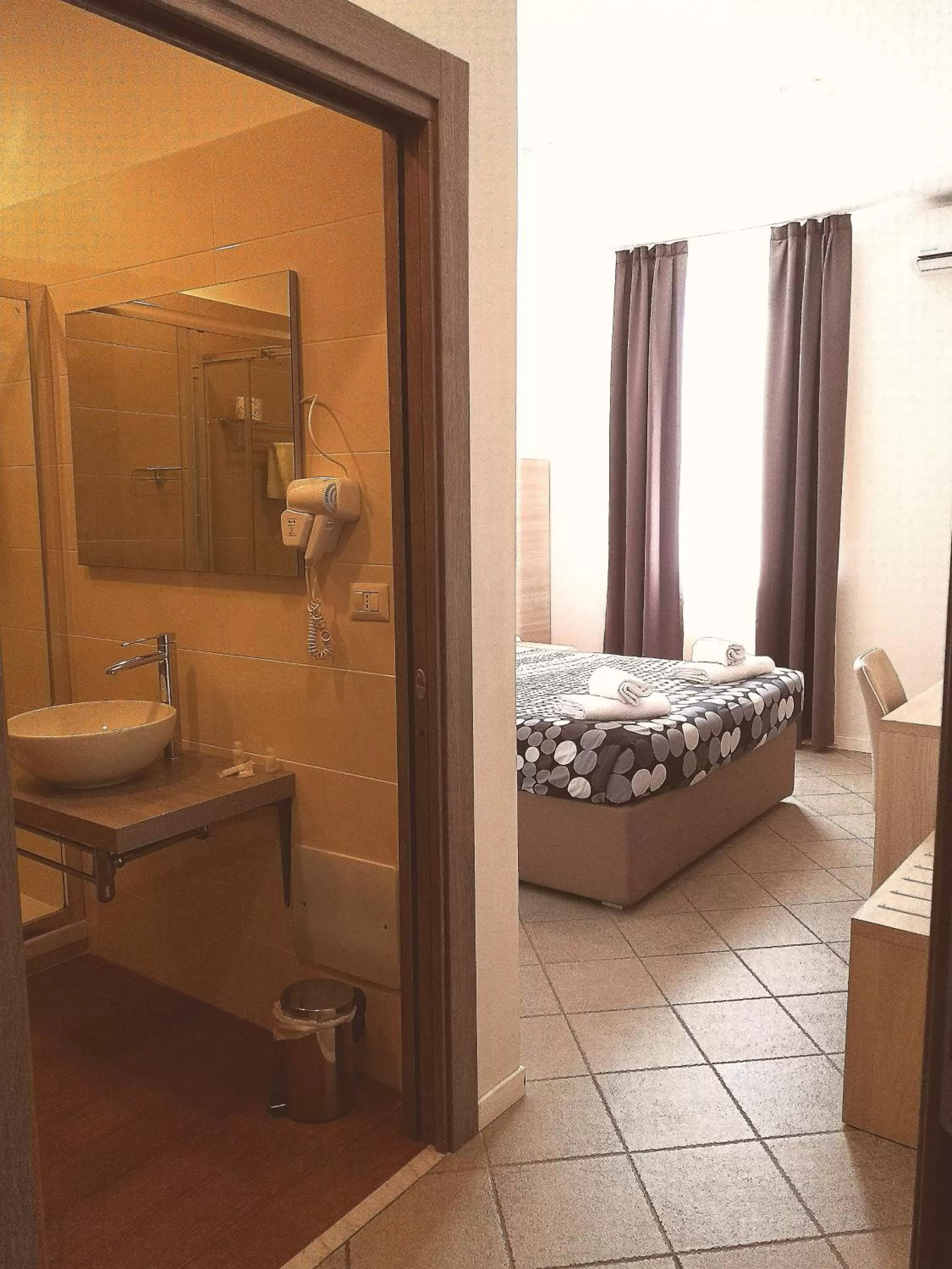 Bed in Academy Hotel