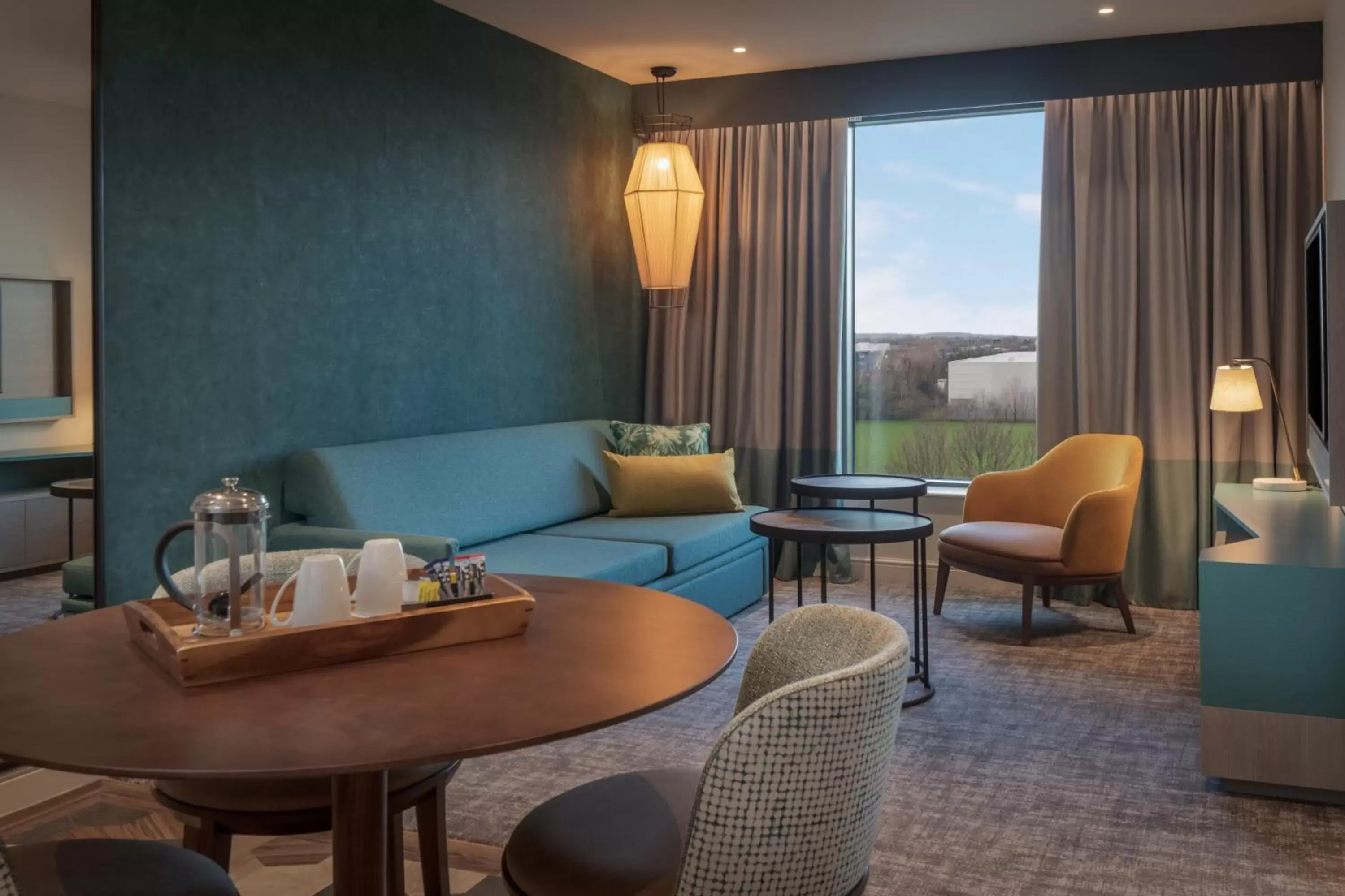 Living room, Seating Area in Staybridge Suites London Heathrow - Bath Road, an IHG Aparthotel