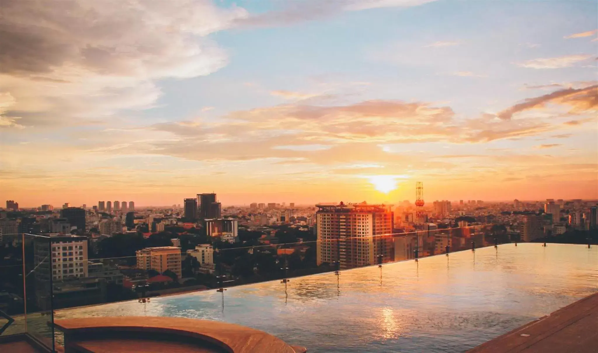 Pool view, Sunrise/Sunset in Hotel Des Arts Saigon Mgallery Collection