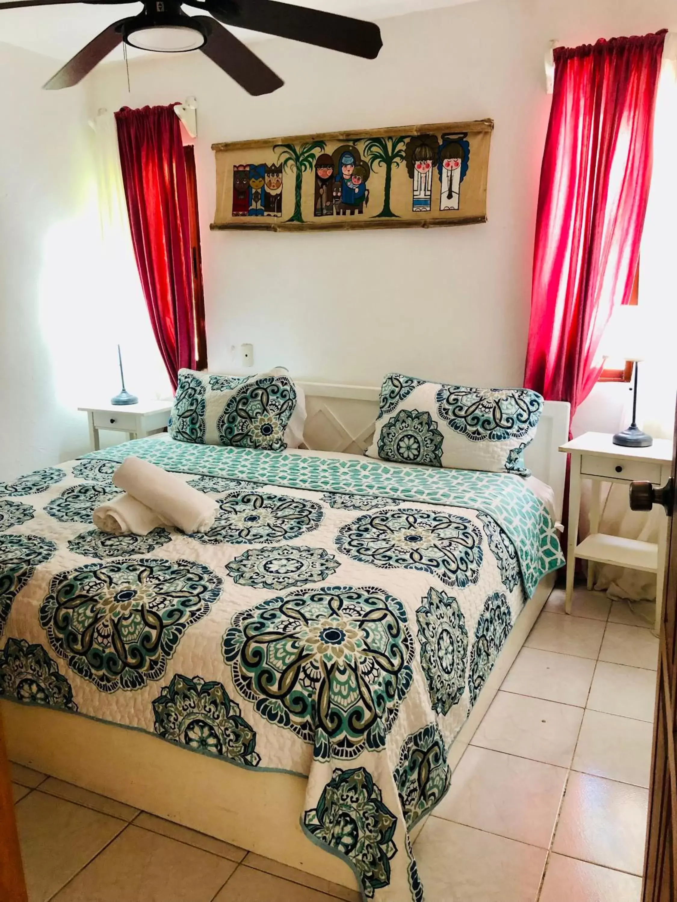 Bed in Los Corales Luxury Villas Beach Club and Spa