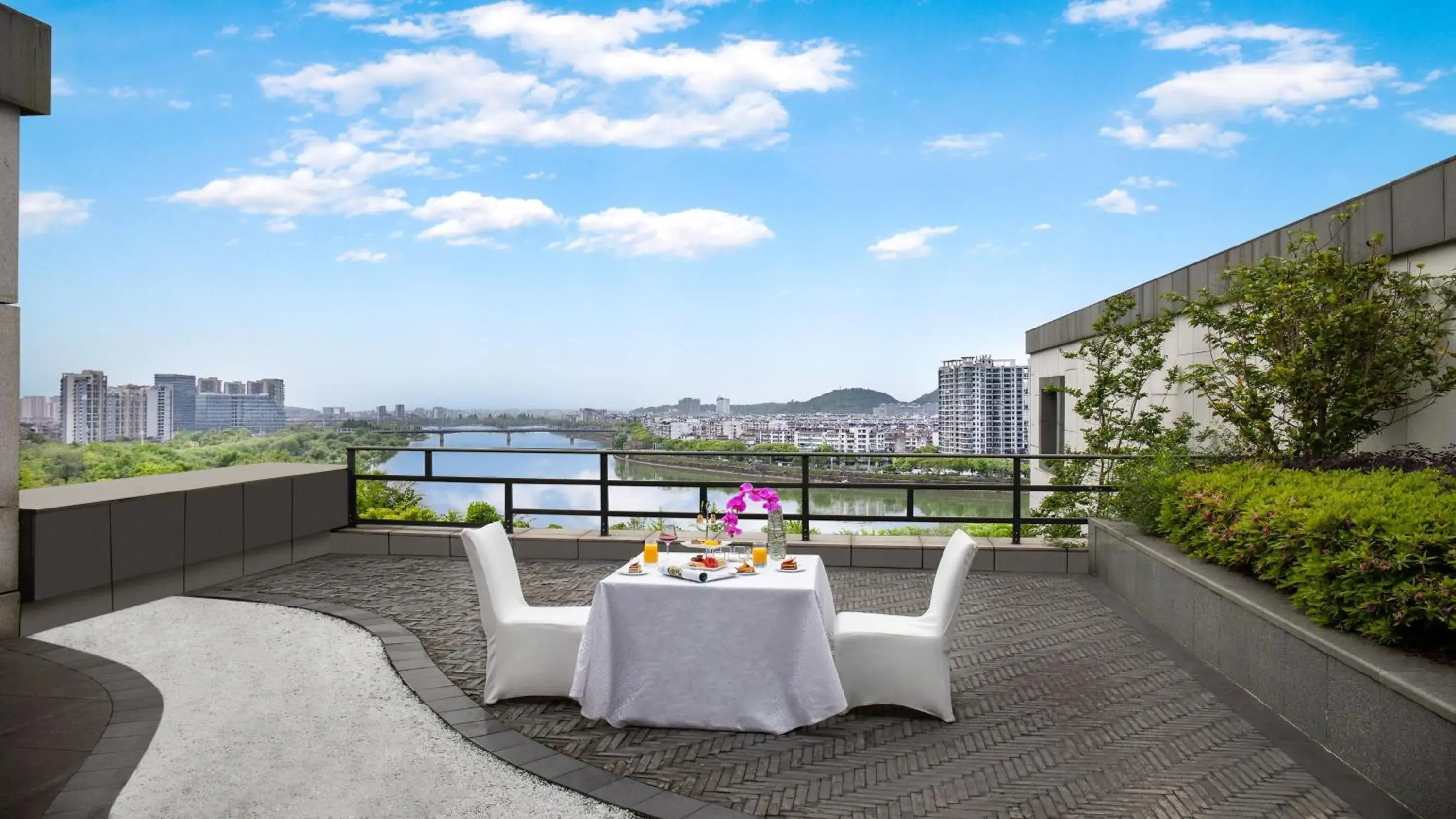 Property building, Balcony/Terrace in Crowne Plaza Huangshan Yucheng, an IHG Hotel