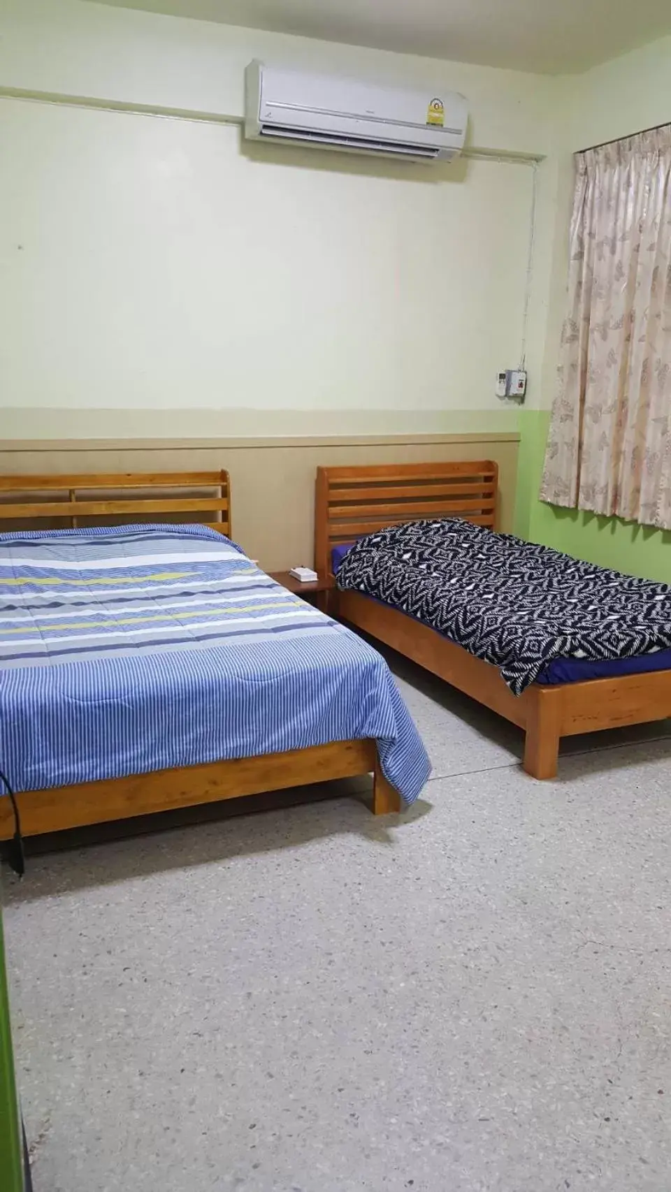Bed in Sataya Apartment