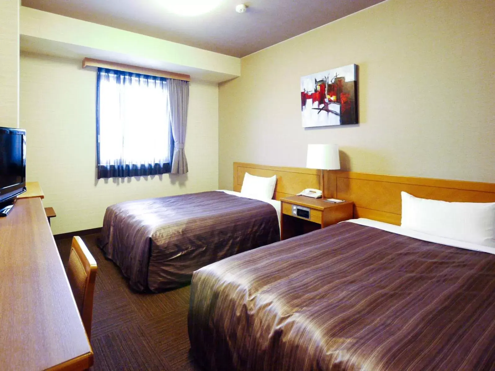 Photo of the whole room, Bed in Hotel Route-Inn Tajimi Inter