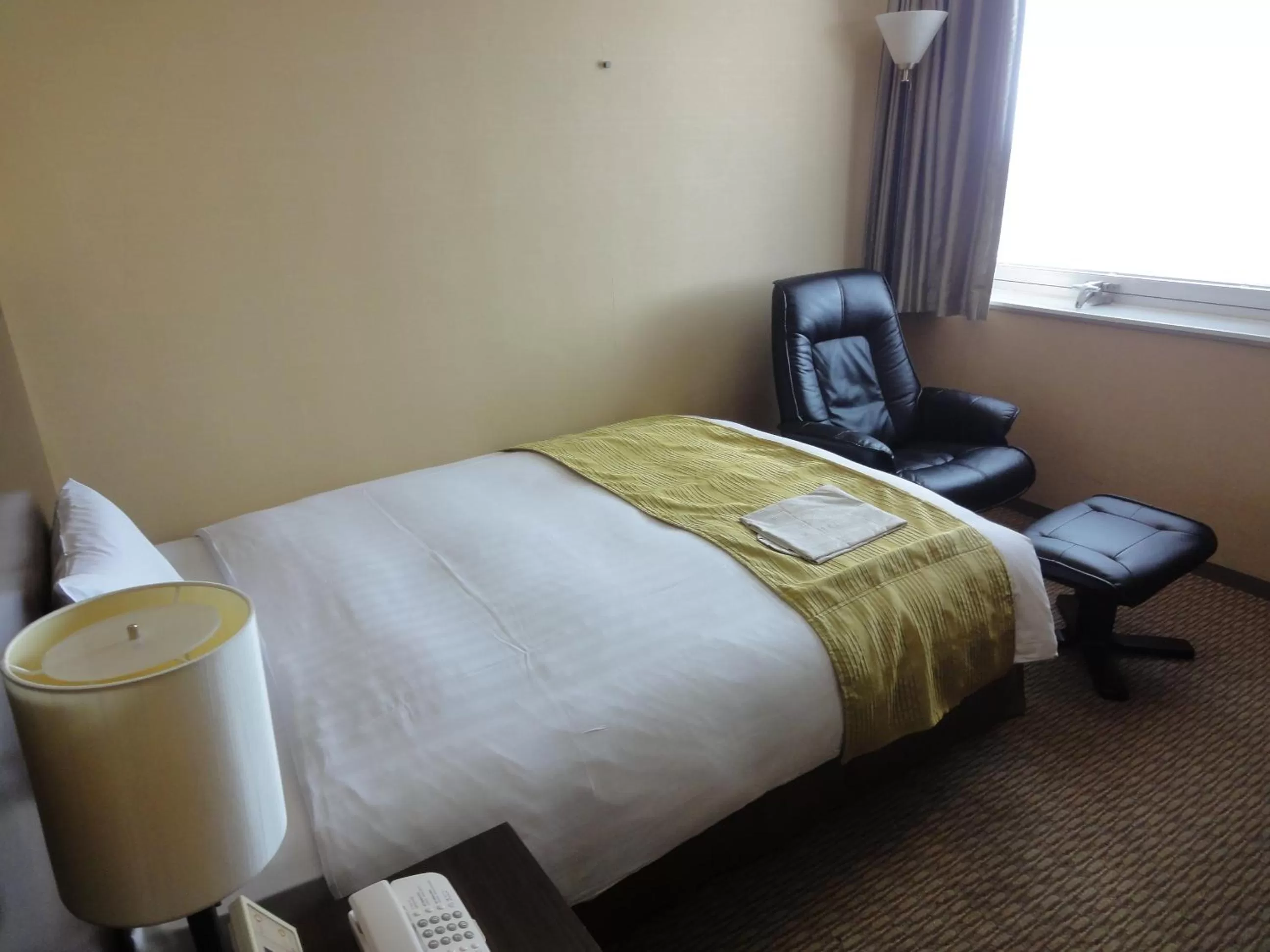 Bed in Hotel Nikko Tsukuba