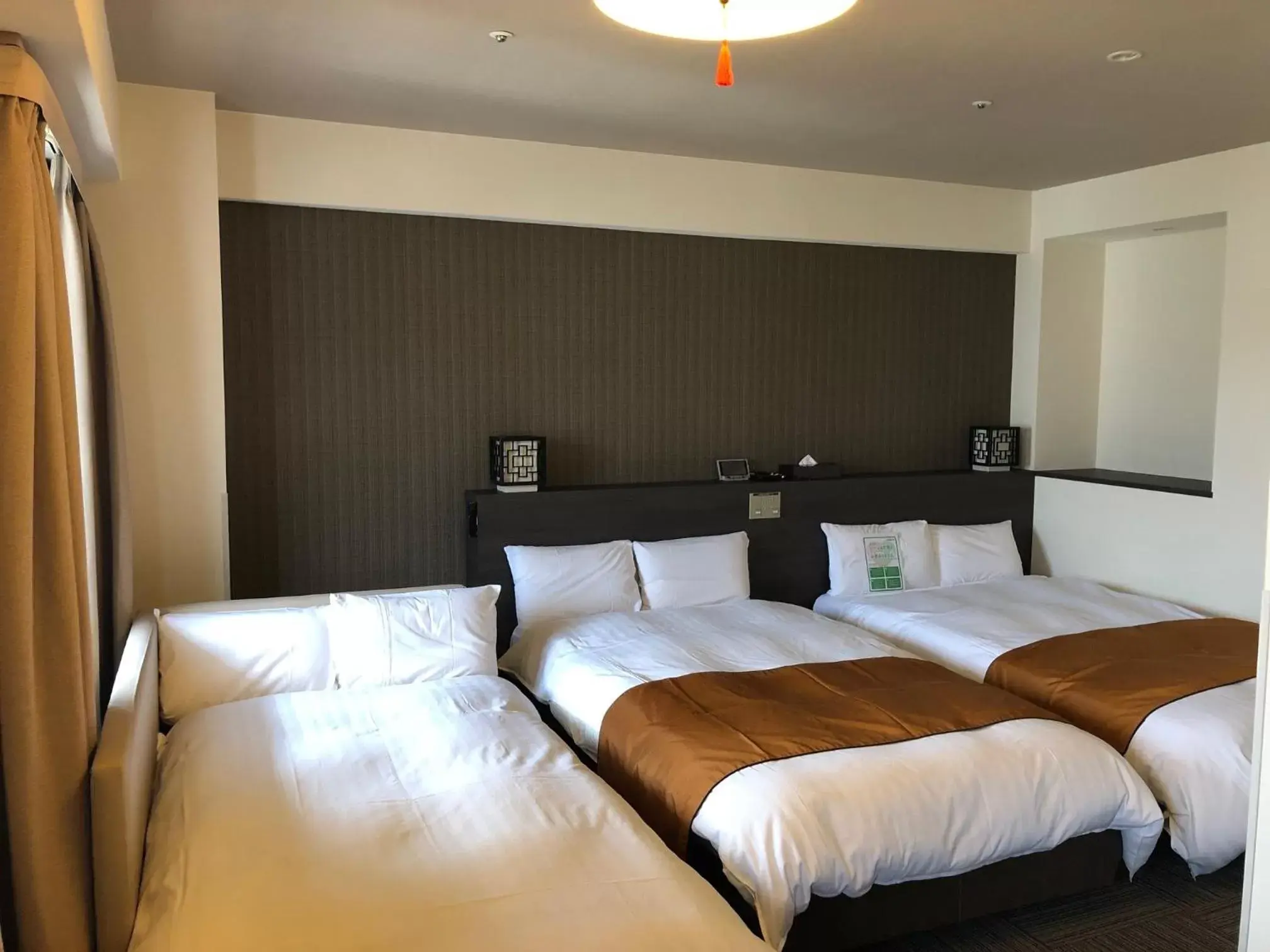 Bed in Dormy Inn Nagasaki Shinchichukagai Bed in Dormy Inn Nagasaki Shinchichukagai