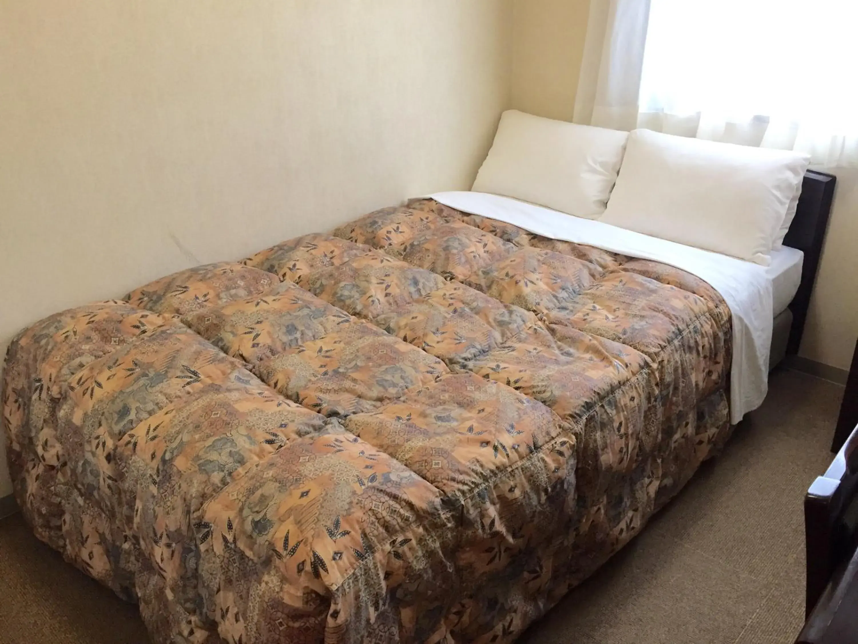 Bed in Hotel Crown Hills Toyama