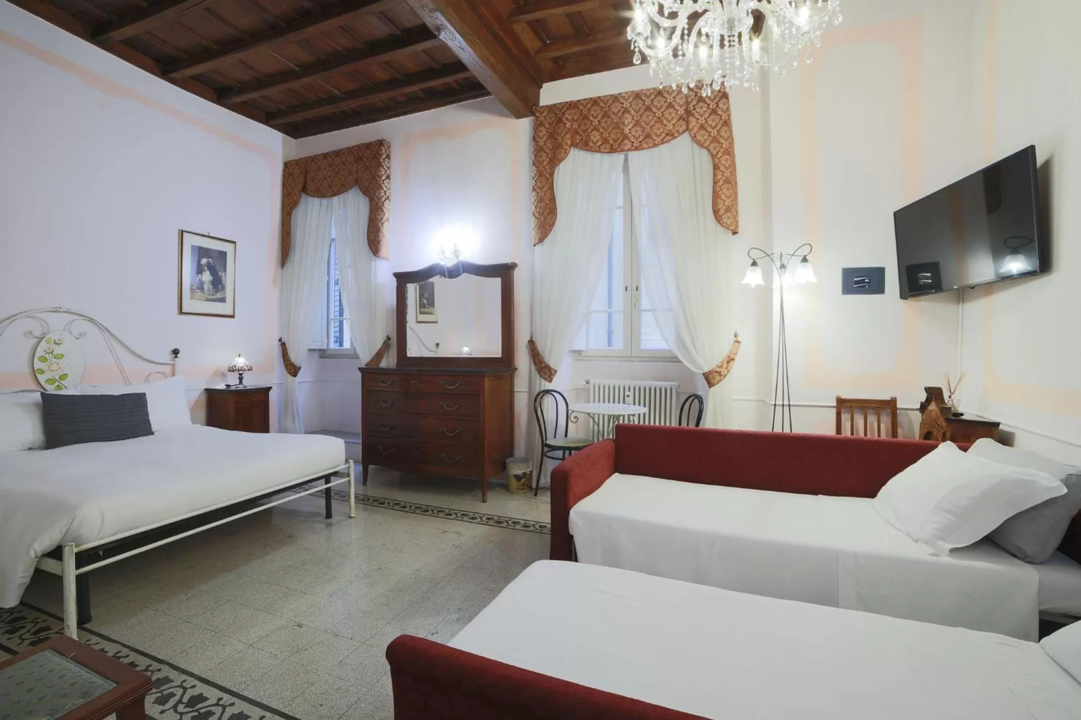 Photo of the whole room, Bed in La Maison Dell'Orologio