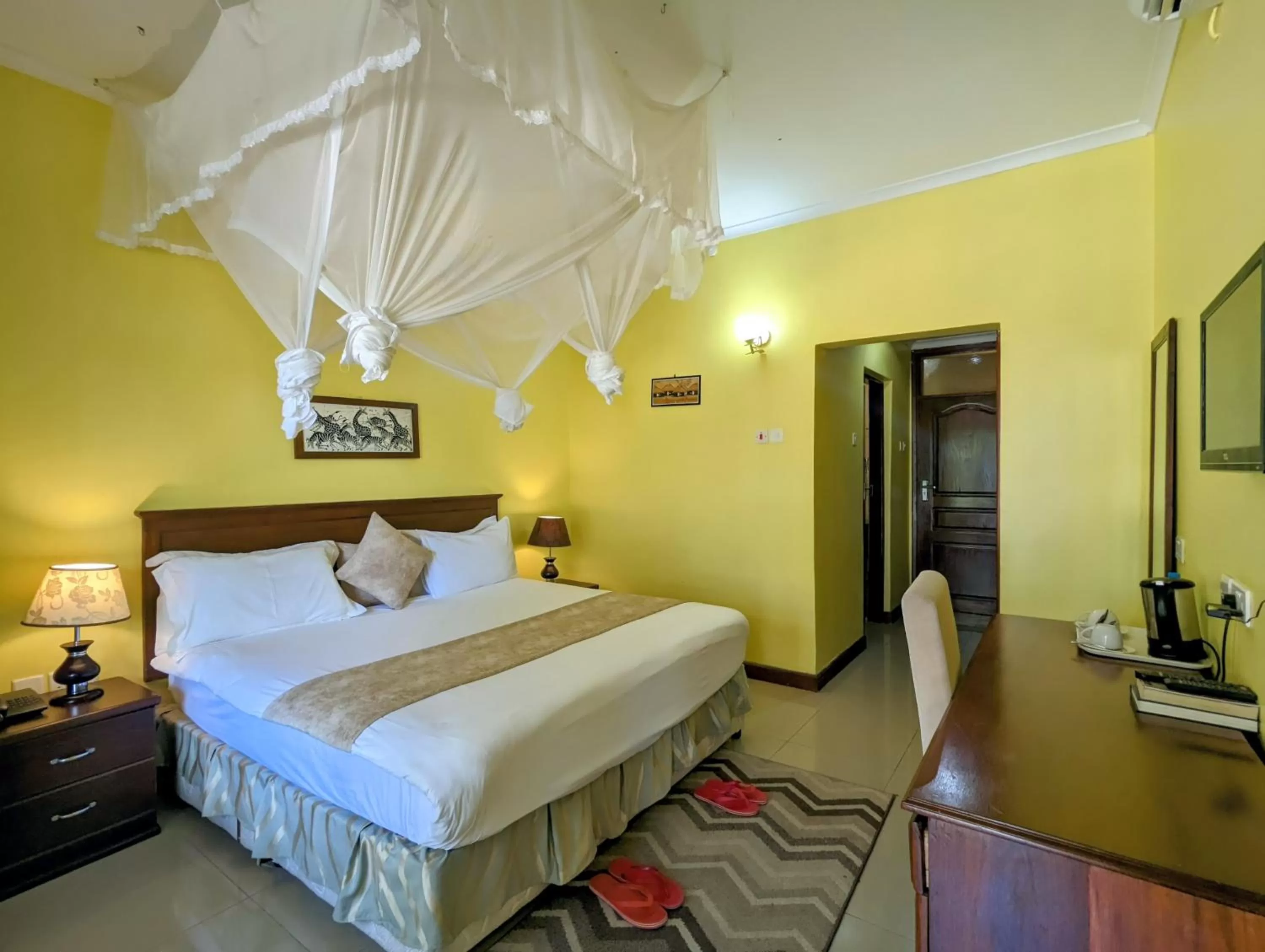 Bed in Mvuli Hotels Arusha