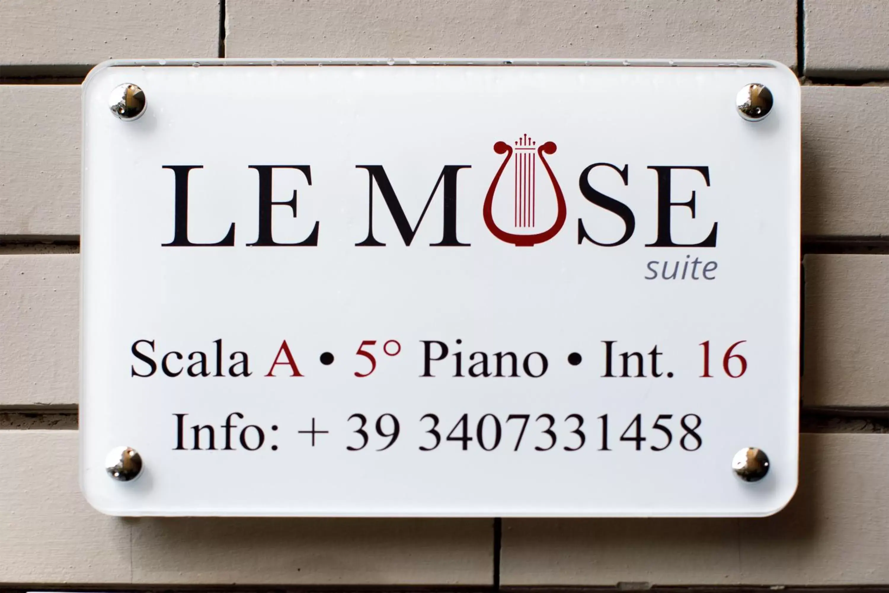 Property logo or sign in Le Muse Suite