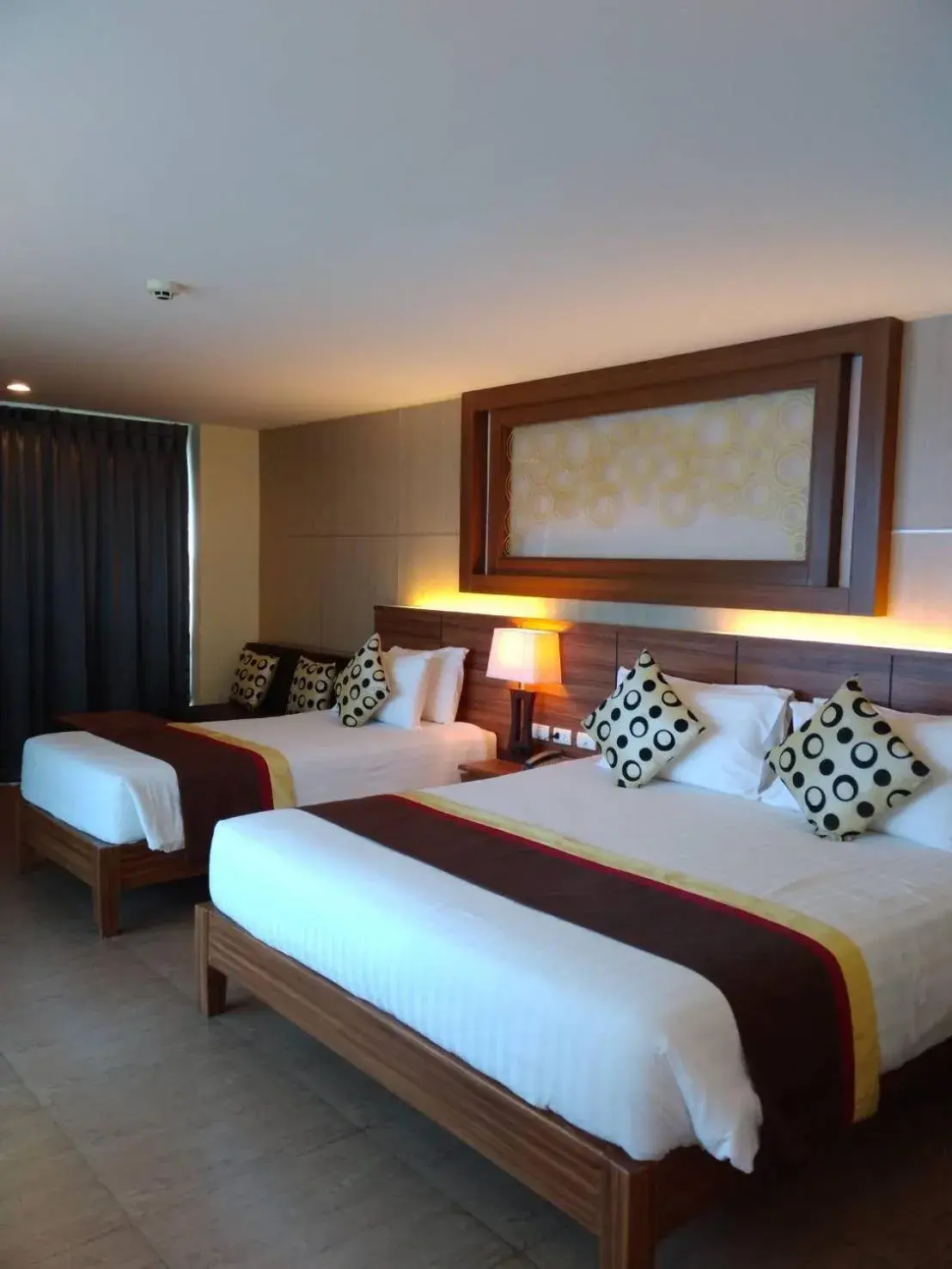 Bed in Saisawan Beach Resort