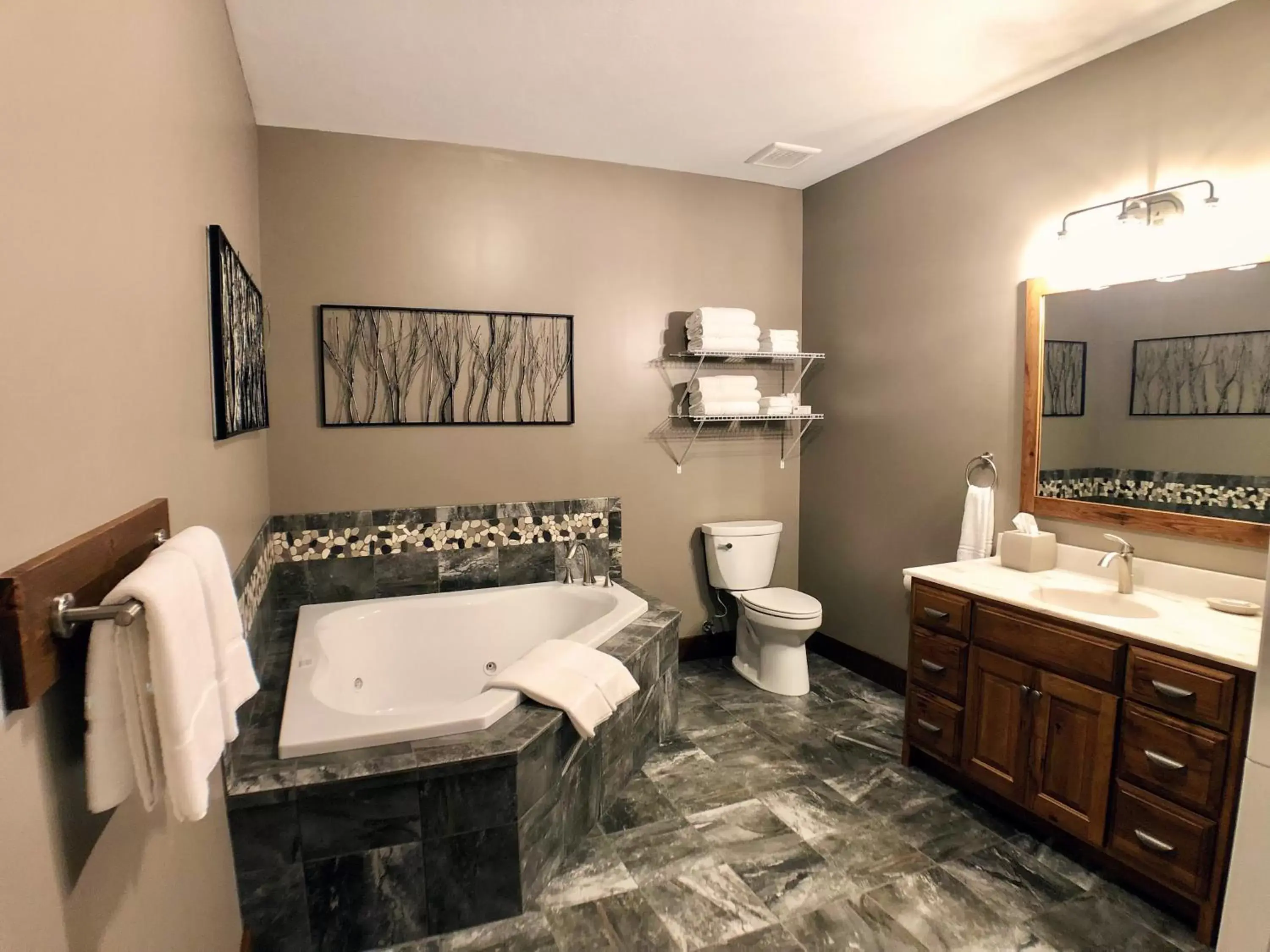 Bathroom in Sojourner's Lodge & Log Cabin Suites