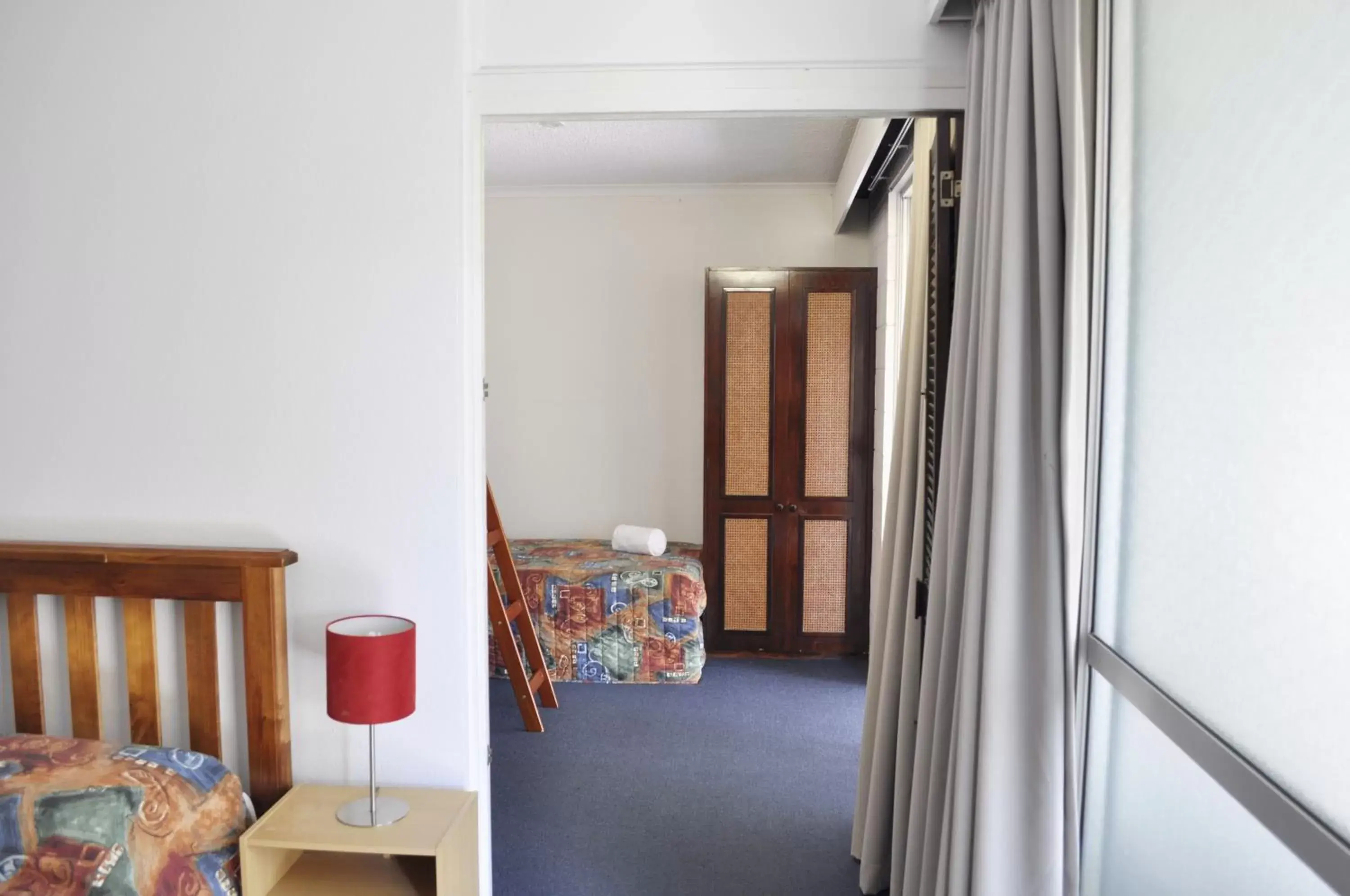 Bedroom, Seating Area in Alexandra Park Motor Inn