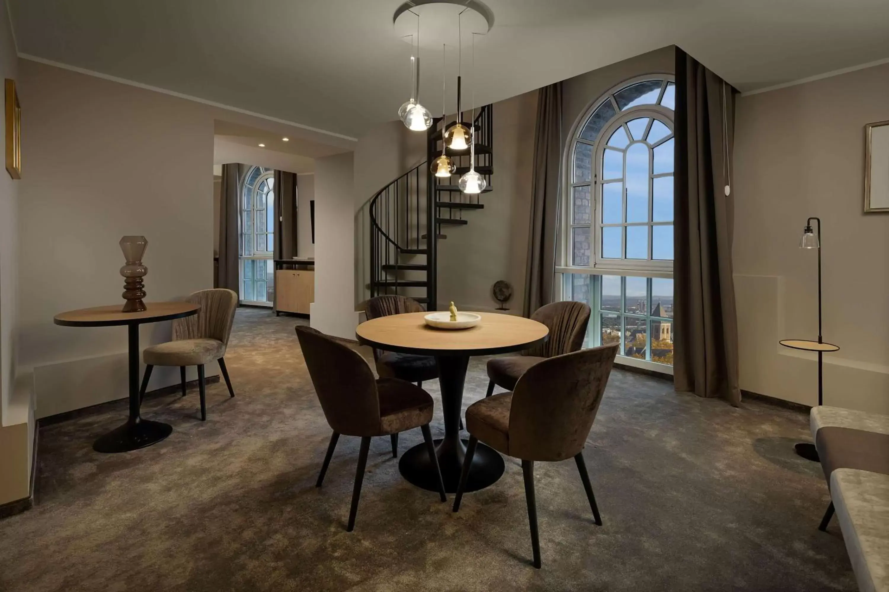 Living room, Dining Area in Wasserturm Hotel Cologne, Curio Collection by Hilton